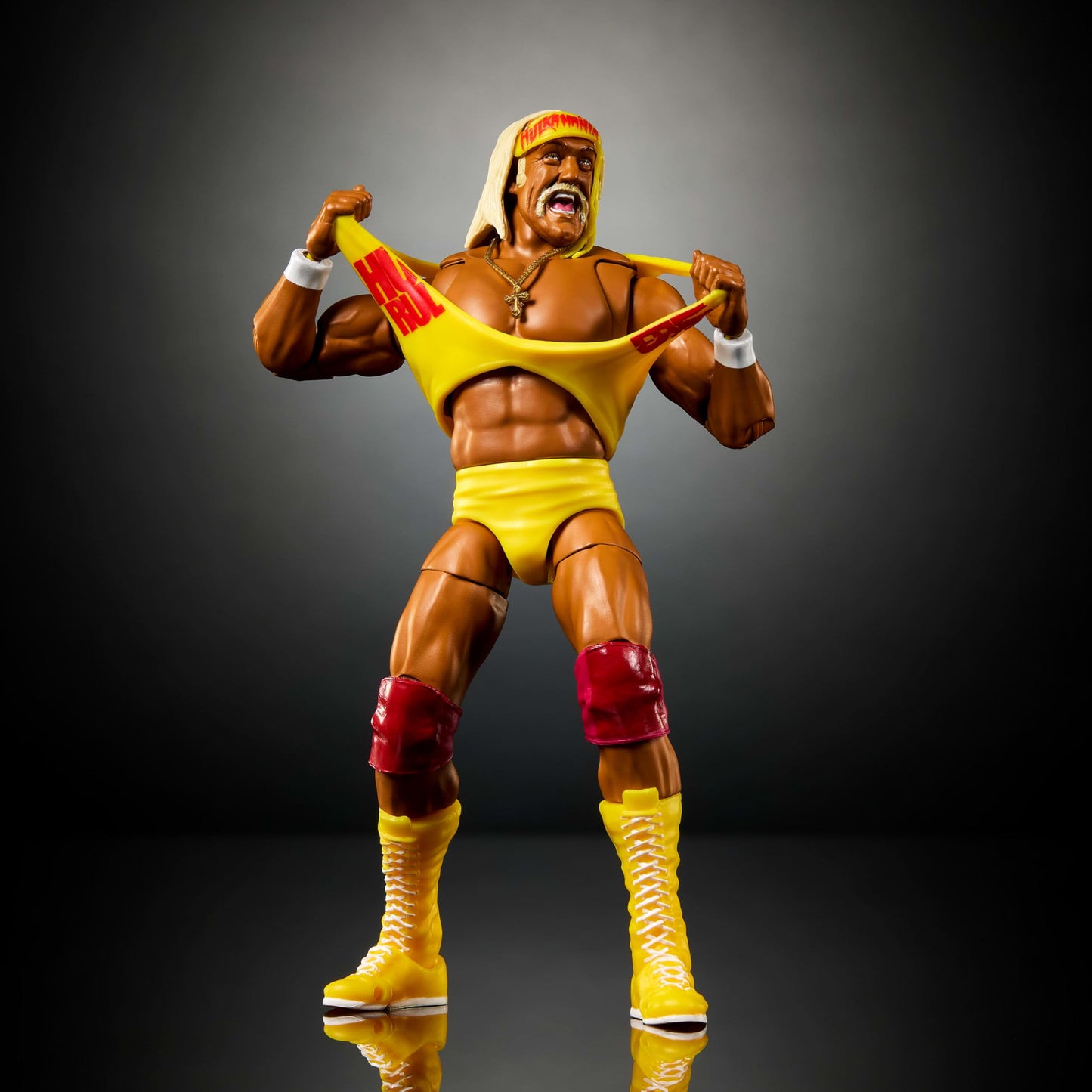 Mattel WWE Ultimate Edition Action Figure & Accessories Set, Hulk Hogan 6-inch Collectible with Swappable Heads & Hands, 30 Articulation Points