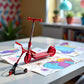 JIANSHUILIAN Red Mini Finger Scooter, Cute Mini Skateboards Plastic Finger Skateboards Finger Sport Interactive Photography Props Finger Boards