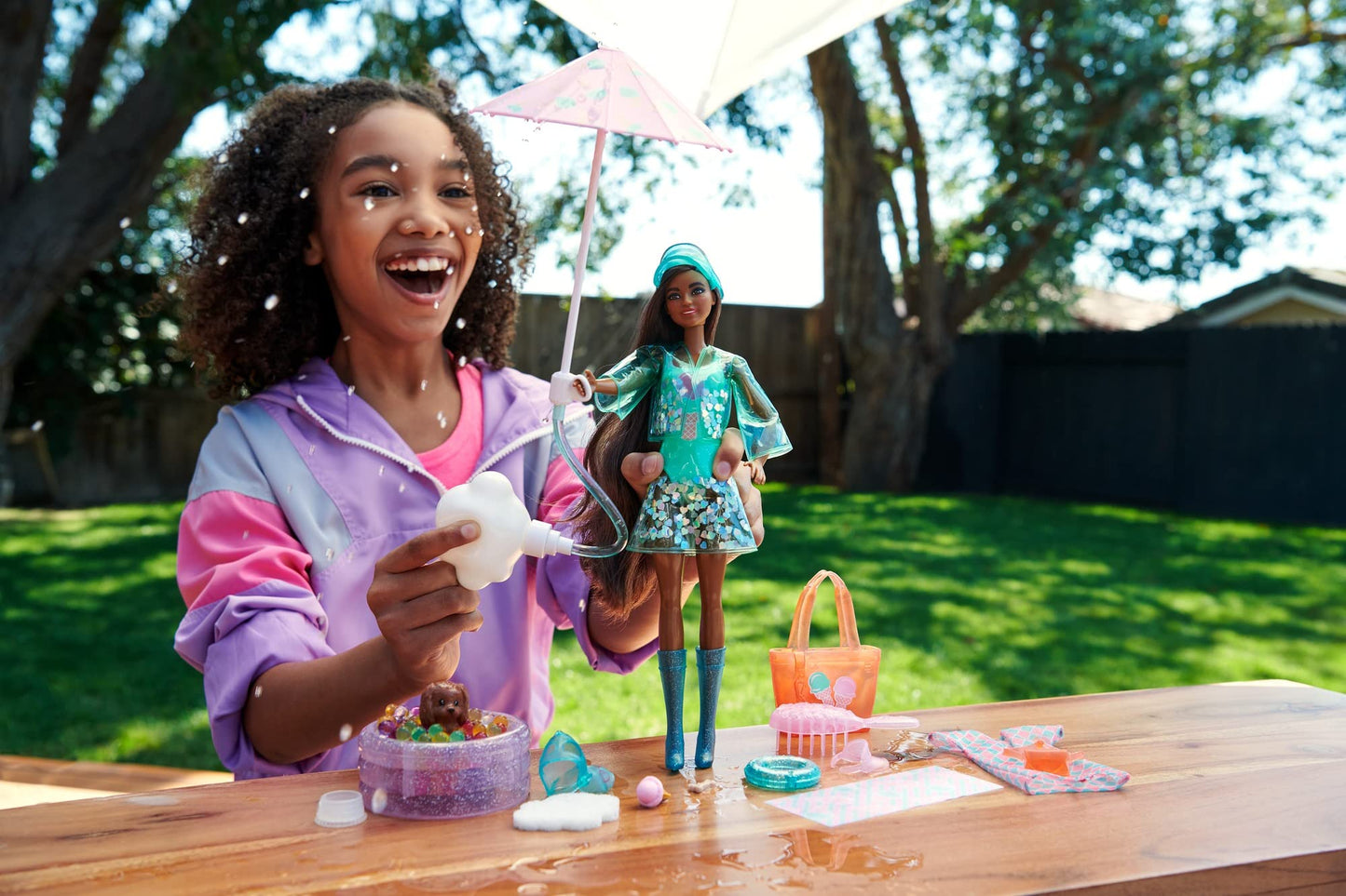 Barbie Color Reveal Sunshine and Sprinkles Doll & Accessories with 25 Surprises, Ice Cream Theme Including Water-Shower Umbrella & Color Change