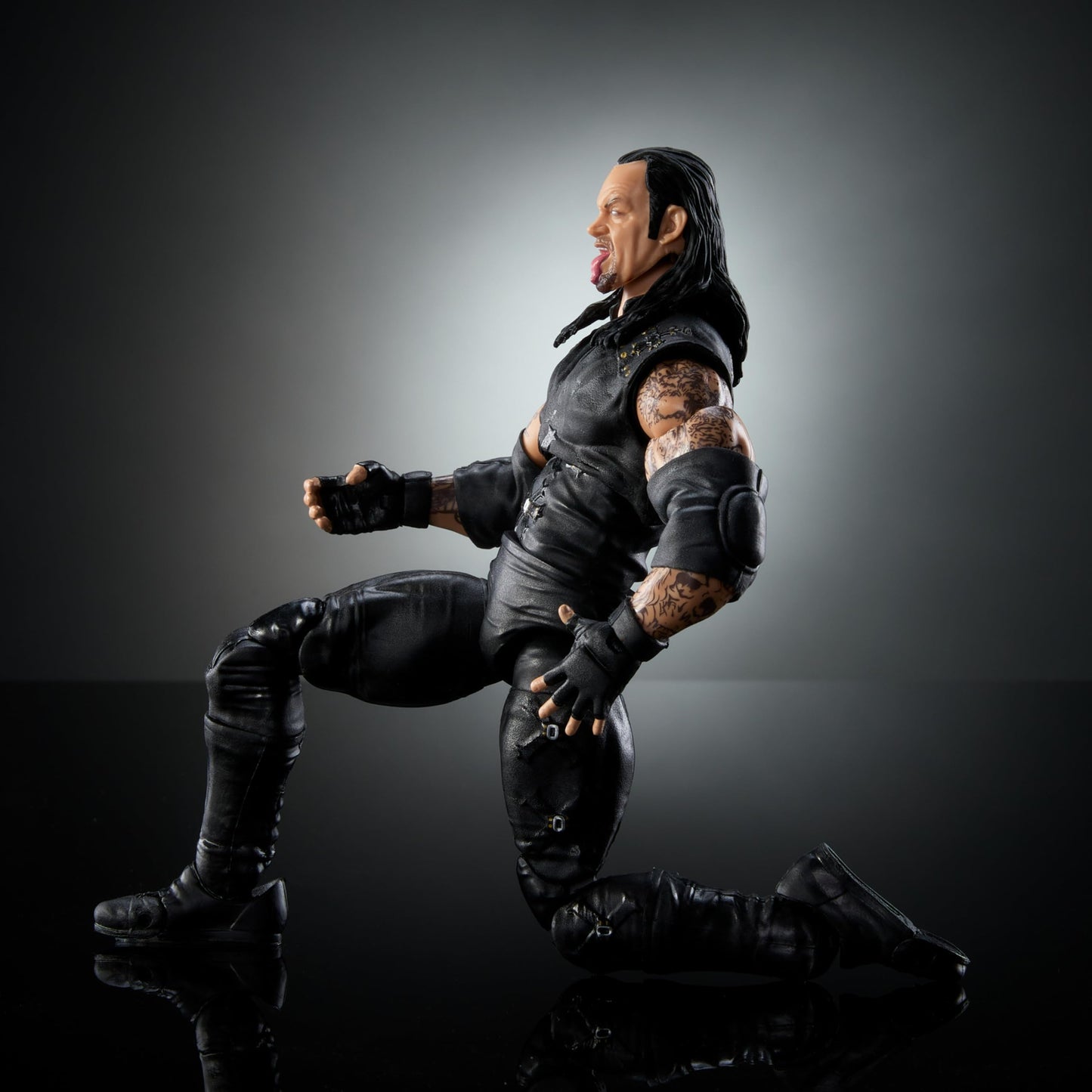 Mattel WWE Ultimate Edition Action Figure & Accessories Set, Undertaker 6-inch Collectible with 30 Articulation Points, Swappable Pieces & Entrance