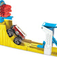 Hot Wheels Monster Trucks Big Air Breakout Play Set with 5 Alarm 1:64 Scale die-cast Metal Body Monster Truck 4 Plastic Crushed Cars 1 Slam Launcher