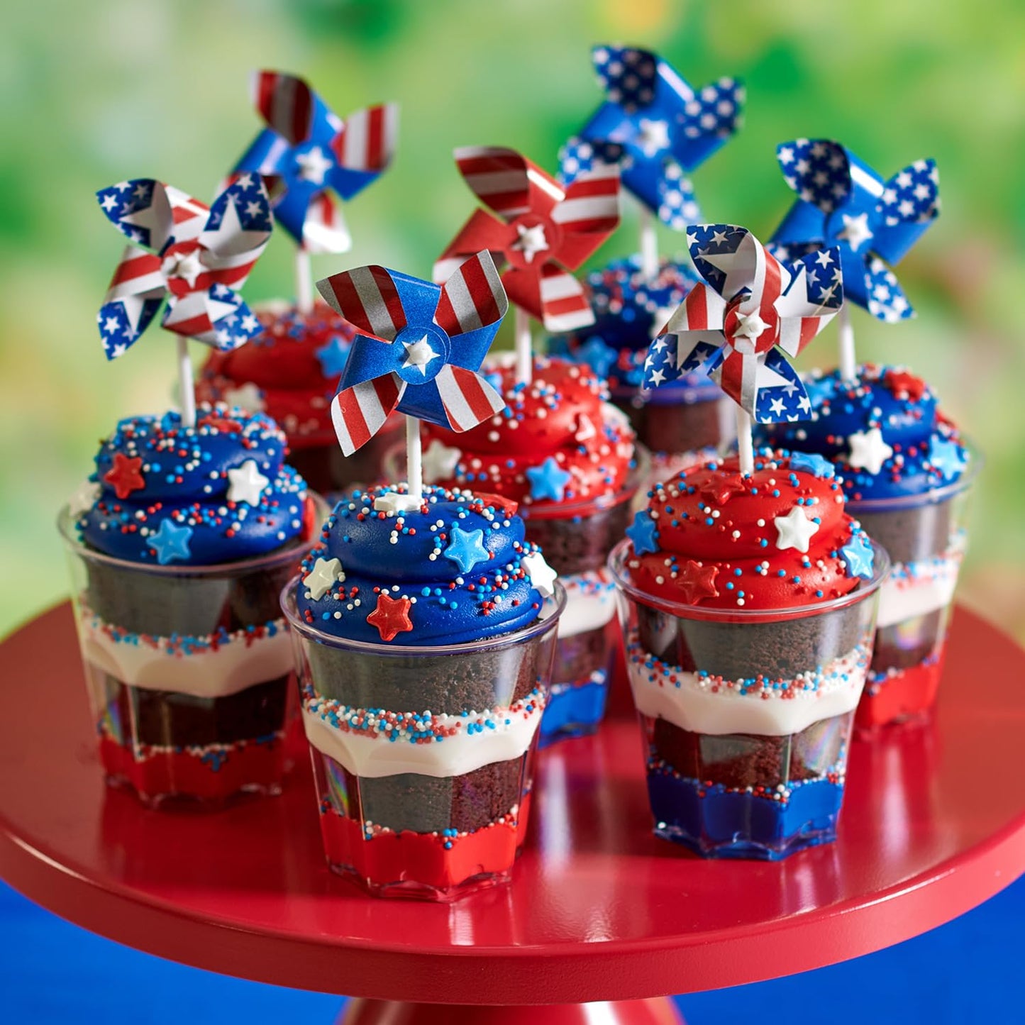 24 x Red, White, Blue Cupcake Toppers By DecoPac, Spinning Pinwheel Decorations, Patriotic Food Safe 4th July Party Decorations - 24 Pack