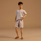 Barbie Basics Model Collector Ken Fashion Doll 10 with Brunette Hair in Shirt & Shorts with Matching Print, Universal-fit Fashions & Posable Body
