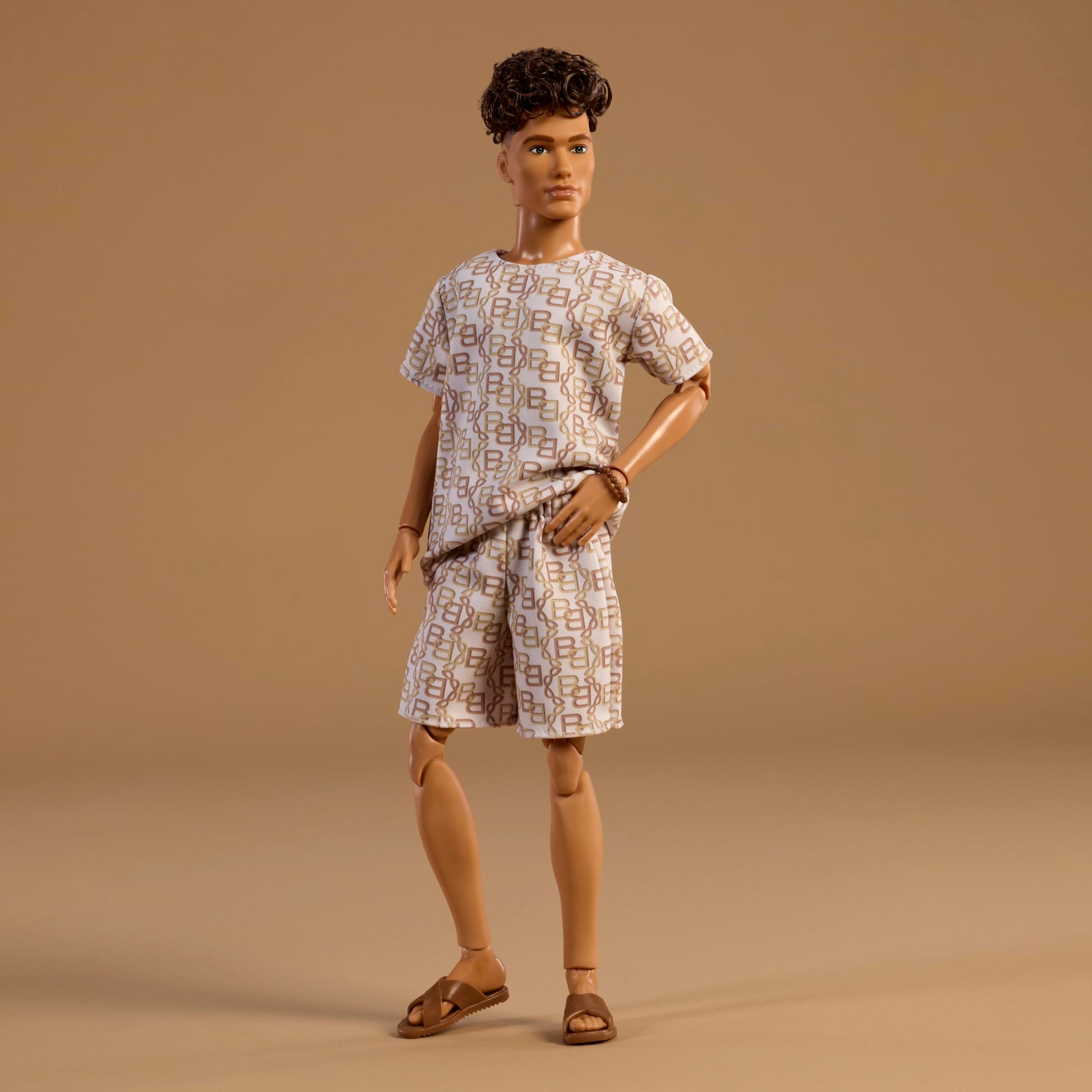 Barbie Basics Model Collector Ken Fashion Doll 10 with Brunette Hair in Shirt & Shorts with Matching Print, Universal-fit Fashions & Posable Body