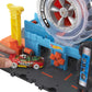 Hot Wheels City Super Twist Tire Shop Playset, Spin The Key to Make Cars Travel Through The Tires, Includes 1 Car, Gift for Kids 4 to 8 Years Old