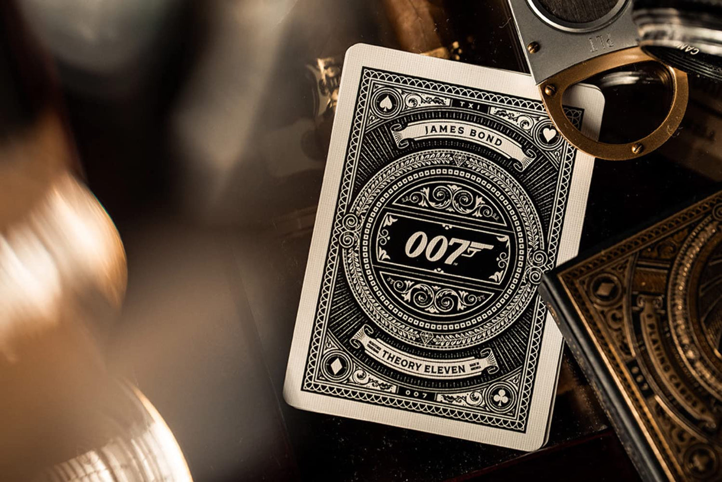 theory11 James Bond 007 Playing Cards - Gold Foil Spy Movie Poker Deck with Custom Aces, Jokers & Court Art for Magic, Cardistry, Game Night, Gifts