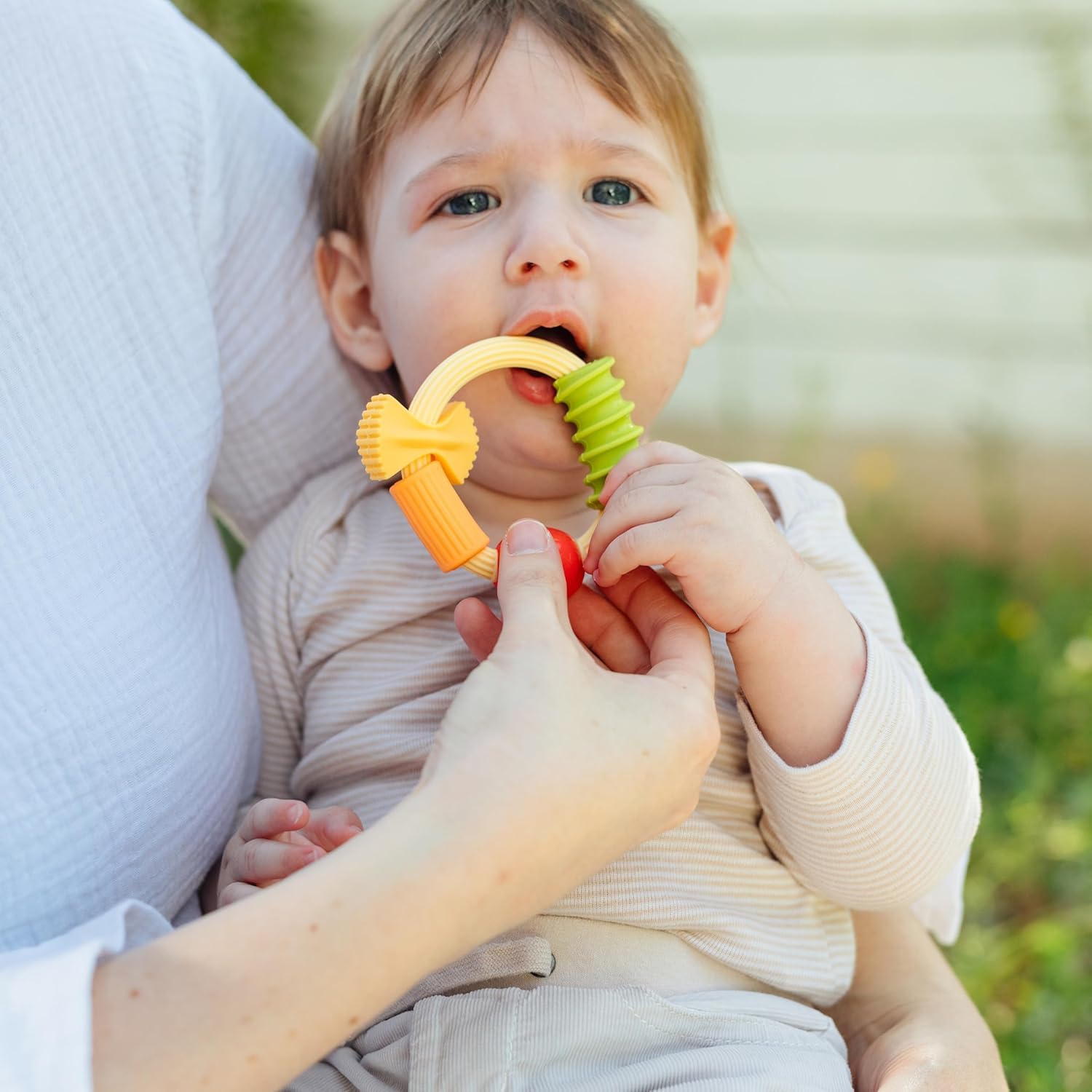 Nuby Pasta Ring Teether - 3+ Months - Soft, Silicone, Multi-Textured, Easy Grip Baby Teething Toy - Natural Teething Relief for Babies