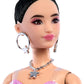 Barbie Deluxe Style Doll #11 in Pink Denim Star-Print Dress with Matching Tights, Black Hair in High Bun, Accessories Like Handbag and Jewelry