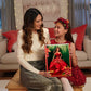 Barbie Signature 2022 Holiday Doll, Light-Brown Wavy Hair Wearing Red Poinsettia-Inspired Gown, Collectible with Doll Stand & Certificate of
