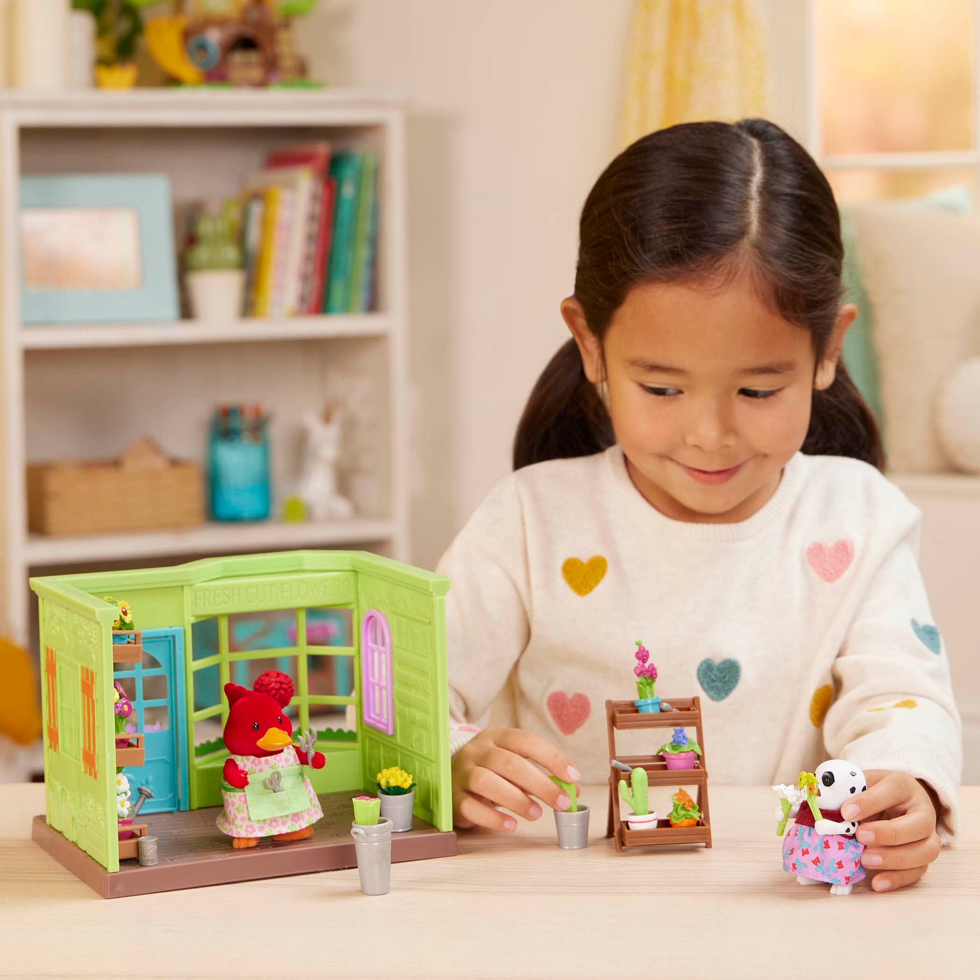 Li'l Woodzeez - Li'l Petals Flower Shop - 29 Pieces Dollhouse Playset with 2 Posable Figures & Storybook - Miniature Furniture & Accessories