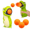 Hog Wild T-Rex Ball Popper Toy - Includes 4 Soft Foam Balls - Squeeze to Pop Air Powered Balls Up to 20 Feet - Launcher Safe for Indoor/Outdoor Play