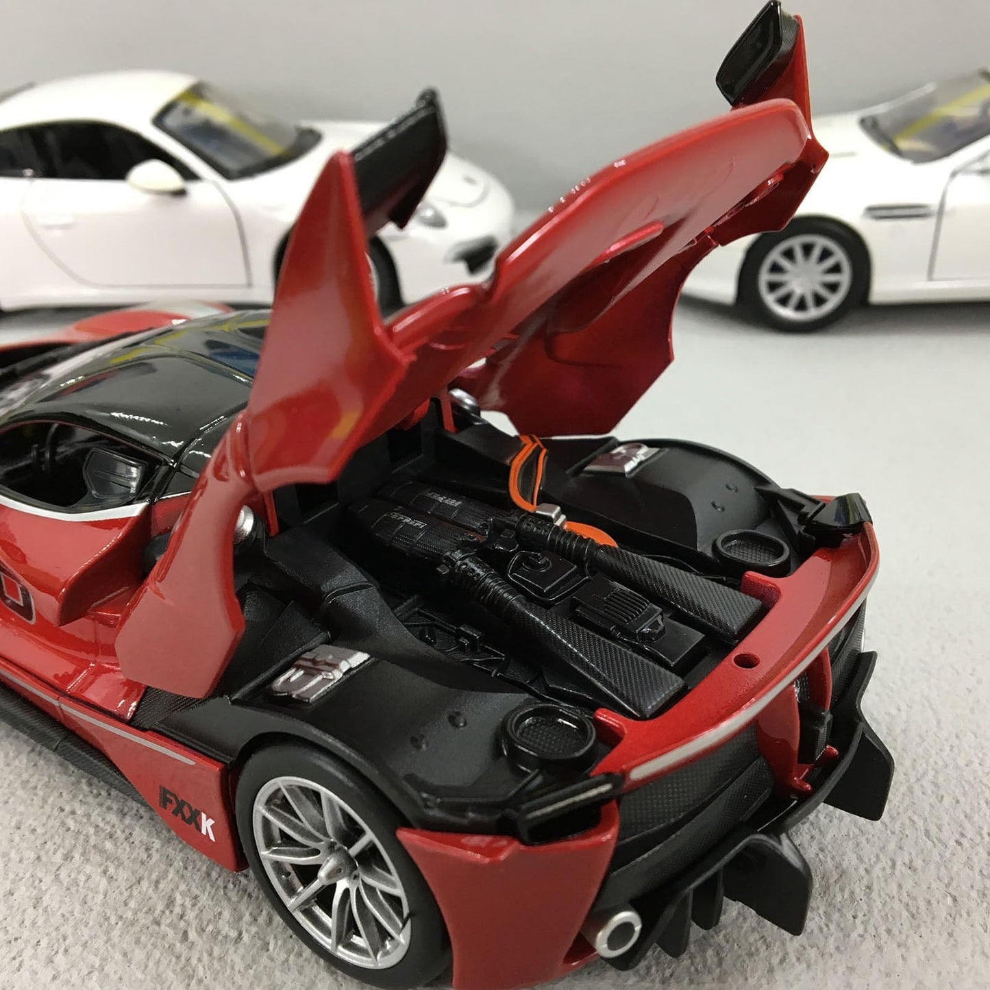 Bburago 1:24 Scale Racing Ferrari FXX-K Die Cast Vehicle (Colors May Vary)