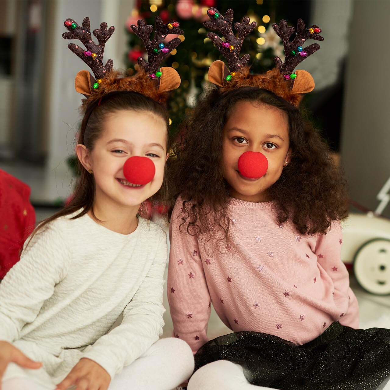 JOYIN Christmas 4PCS Reindeer Headband, Light-Up LED Antlers Reindeer Hat Holiday Headbands for Christmas Party Supplies and Holiday Parties Favors