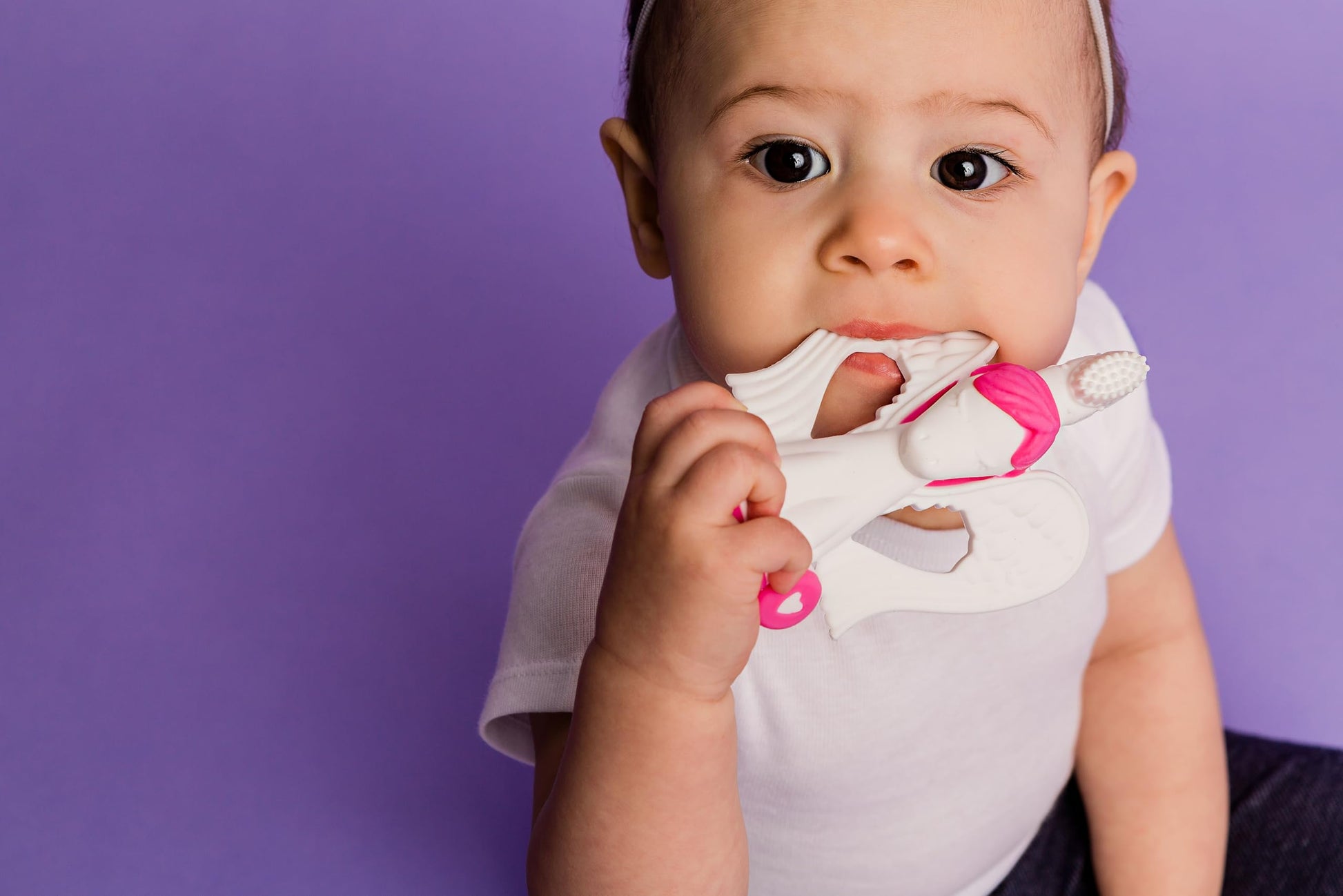 Baby Banana® Unicorn Toothbrush and Teether. Butter Soft Food Grade Bendable silcone with Feather bistles to gnaw on for All Baby Ages. Family-Owned