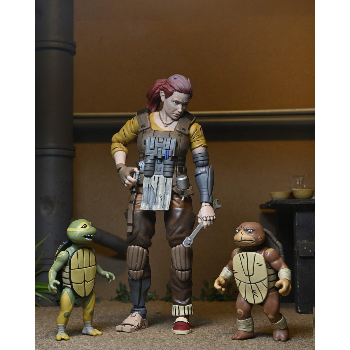 NECA - Teenage Mutant Ninja Turtles (The Last Ronin- The Lost Years) - 7” Scale Action Figure - Grammy April with Baby Yi & Moja