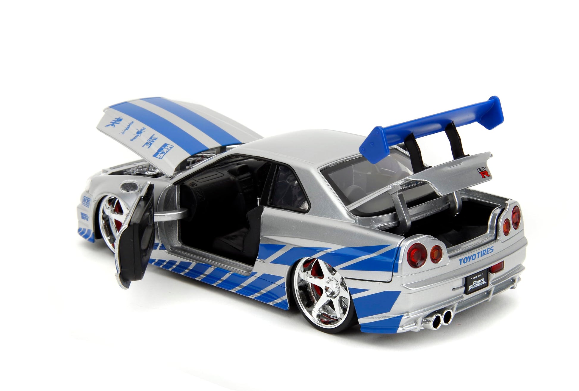 Jada Toys Fast & Furious Brian’s 2002 Nissan Skyline R34 Die-cast Car, 1:24 Scale, Silver & Blue