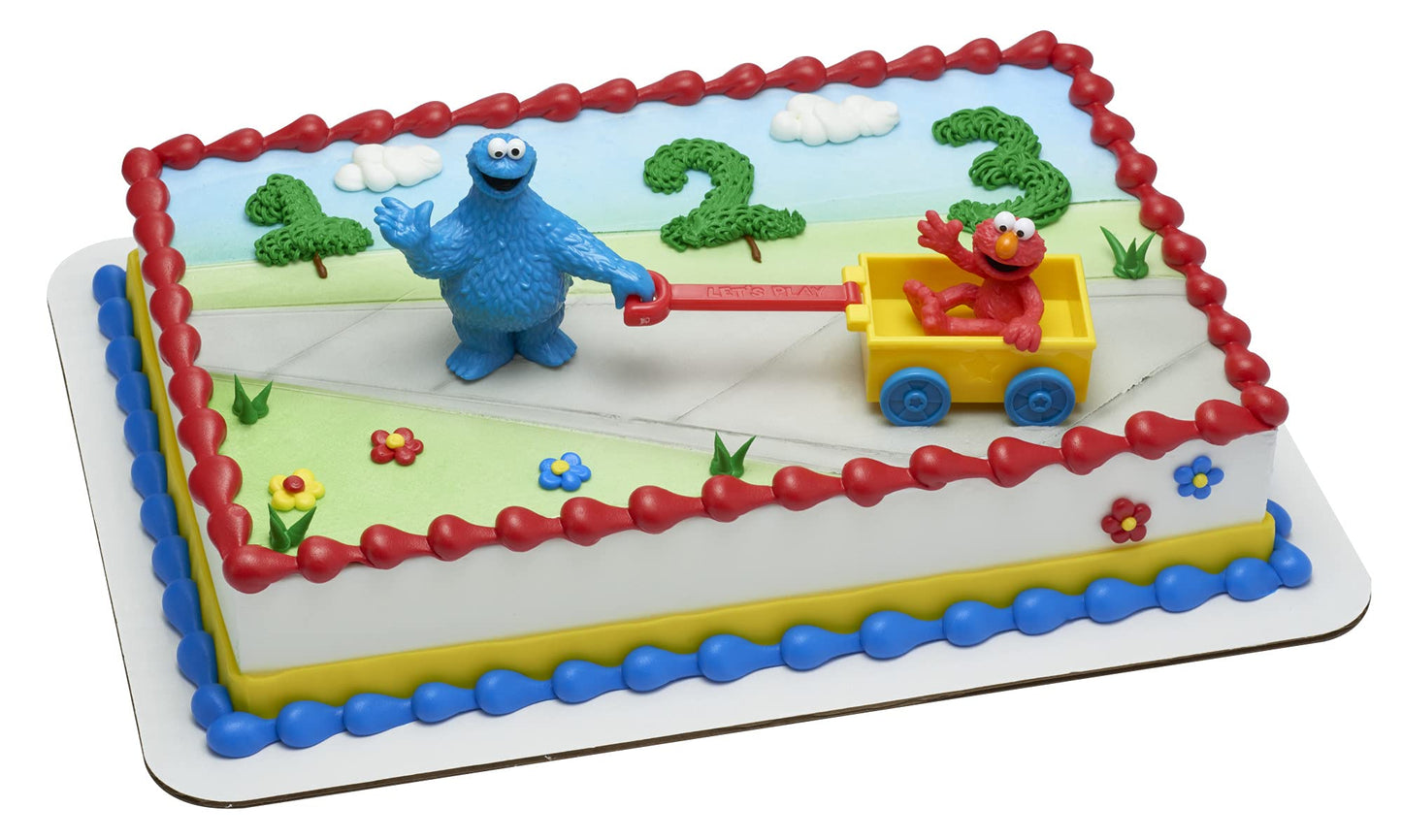 DecoSet® Sesame Street® Let's Play Cake Topper, 2-Piece Birthday Cake Decoration with Cookie Monster and Elmo in a Free-Wheeling Wagon, Ready to Use