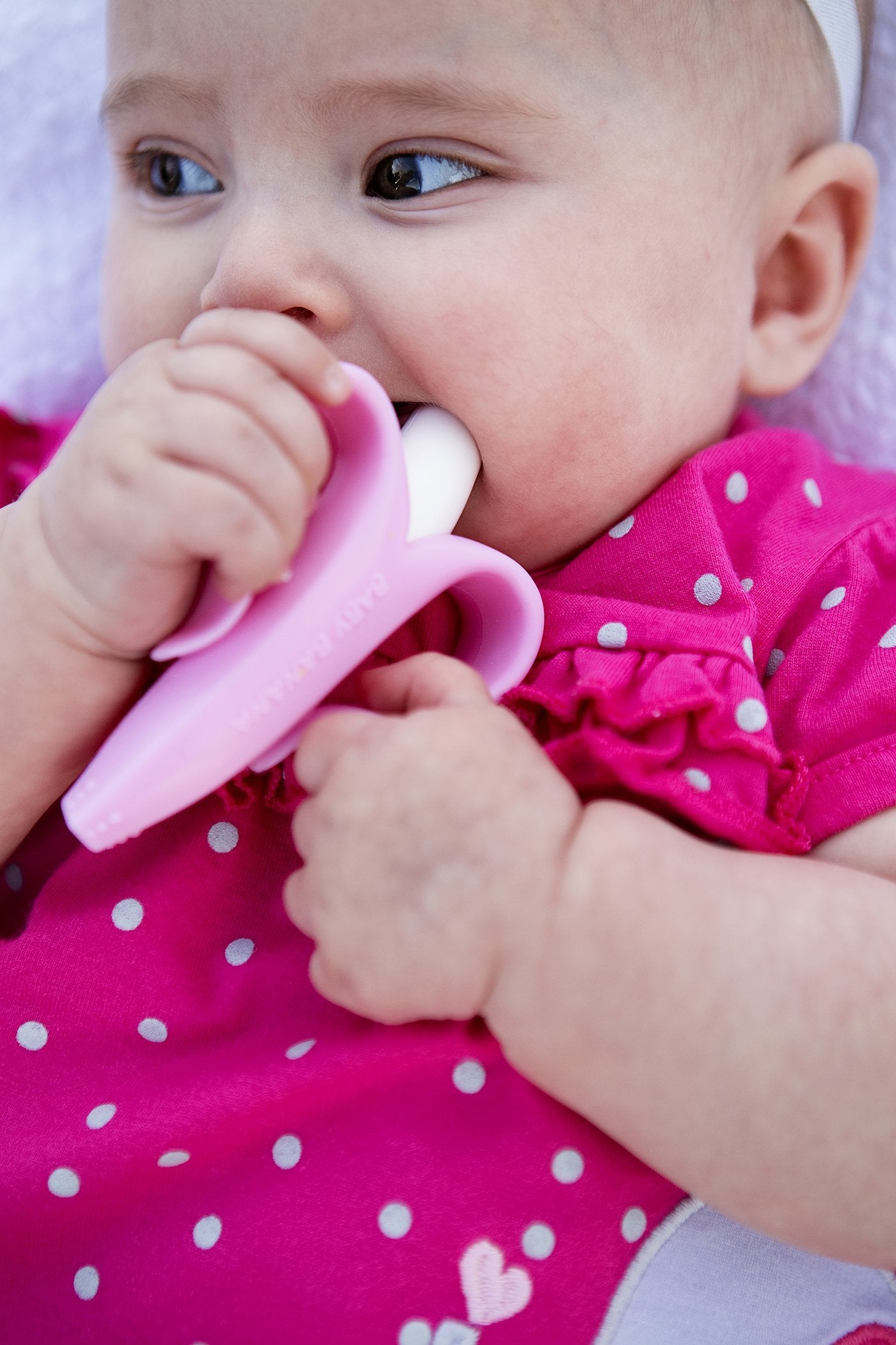 Baby Banana®Pink Teether-Toothbrush, Infant to Toddler, Made in USA, Butter-Soft Bristles for Gums and Teeth, Bendable Food Grade Silicone