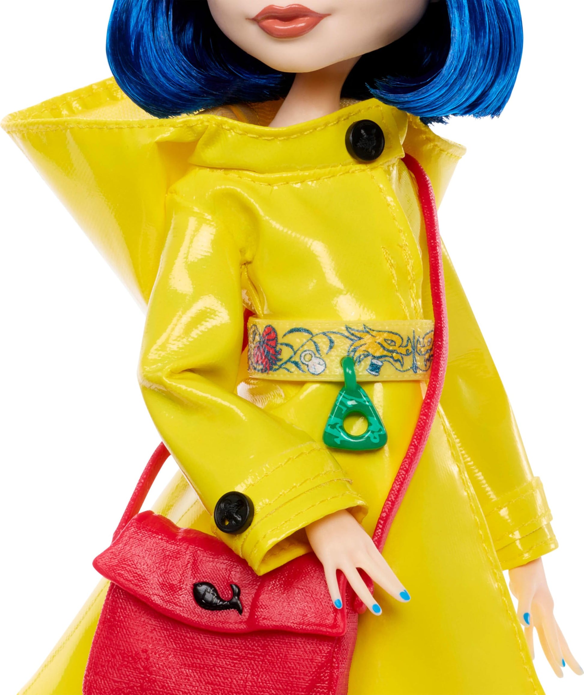 Monster High Skullector Doll, Coraline Collectible in Yellow Raincoat with Dress and Accessories Like Rag Doll, Cat Figure, and Doll Stand