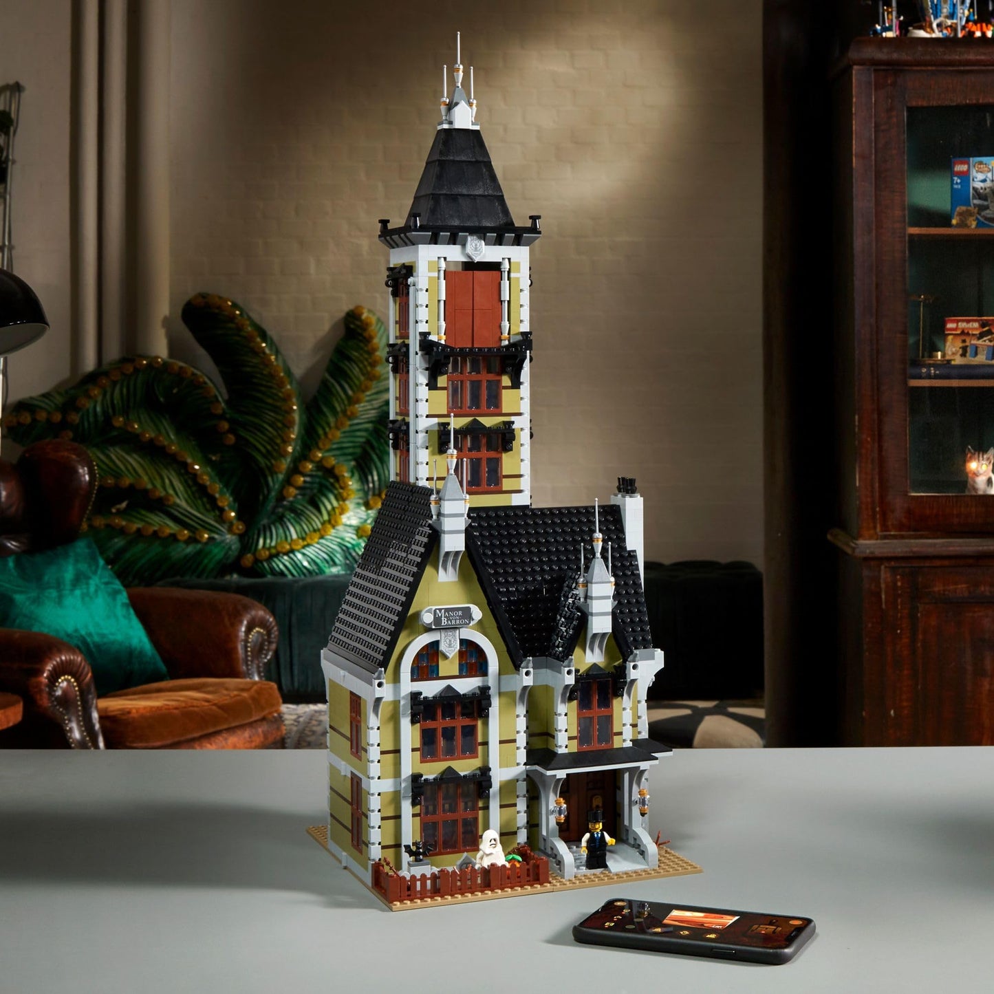 LEGO Icons Haunted House Building Set, Creative Craft for Adults and Family, Haunted House DIY Project to Build Together, Includes 10 Minifigures,