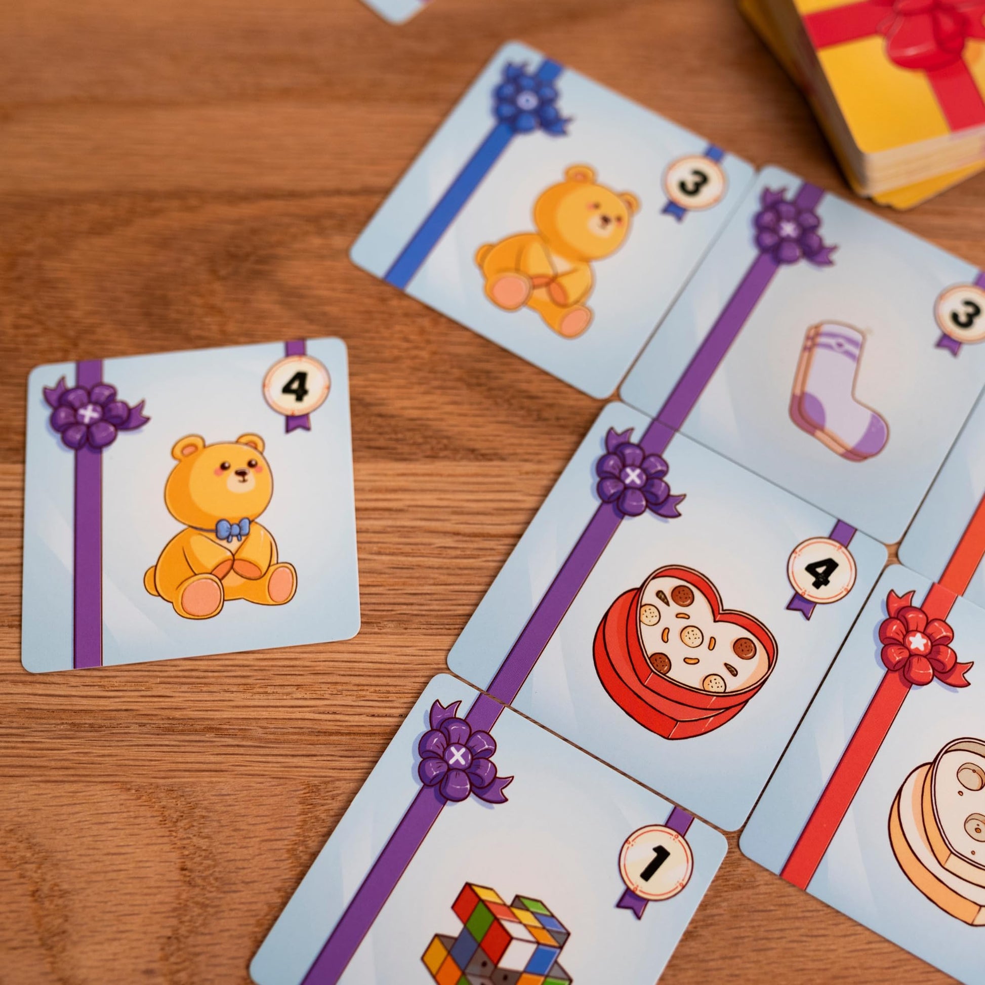 Kado Card Game - Build Your Gift Grid and Outsmart Opponents in a Tactical Gifting & Deduction Strategy Game for Kids & Adults, Ages 8+, 2-5 Players