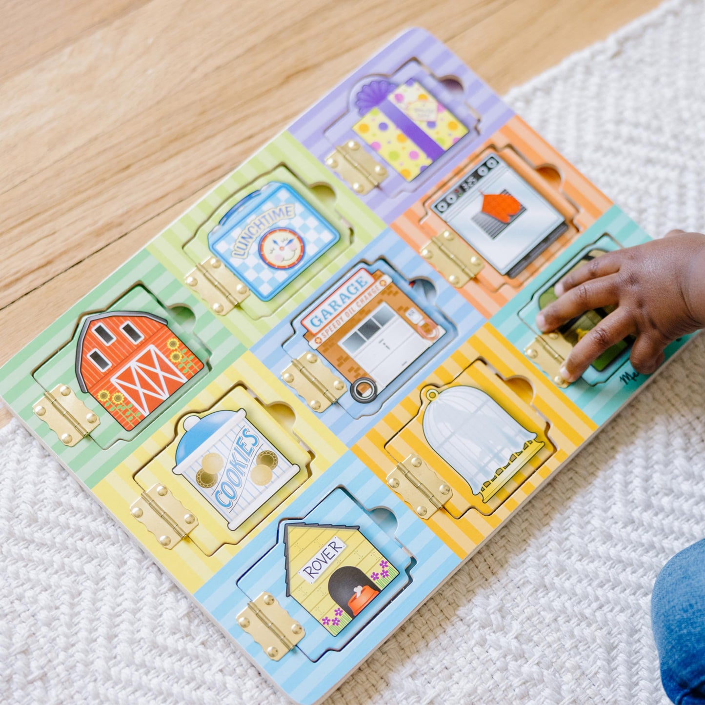 Melissa & Doug Wooden Hide & Seek Activity Board - Montessori Busy Board with Hinges, Doors & 9 Wooden Magnetic Puzzles, Educational Preschool