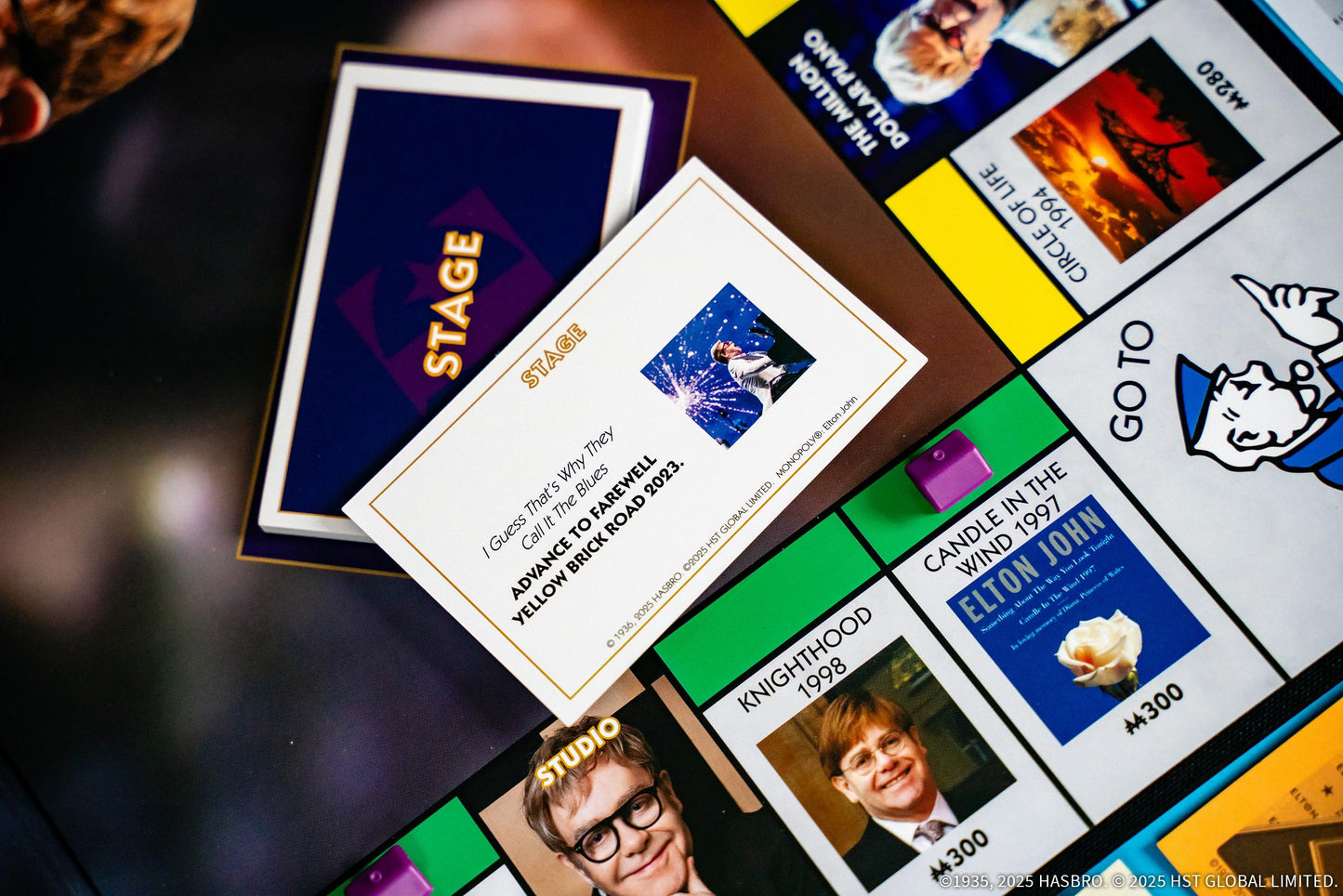 Monopoly: Elton John, Play as Iconic Headgear, Star Glasses & More, Collect Legendary Career Moments Like Knighthood & Farewell Tour, Officially