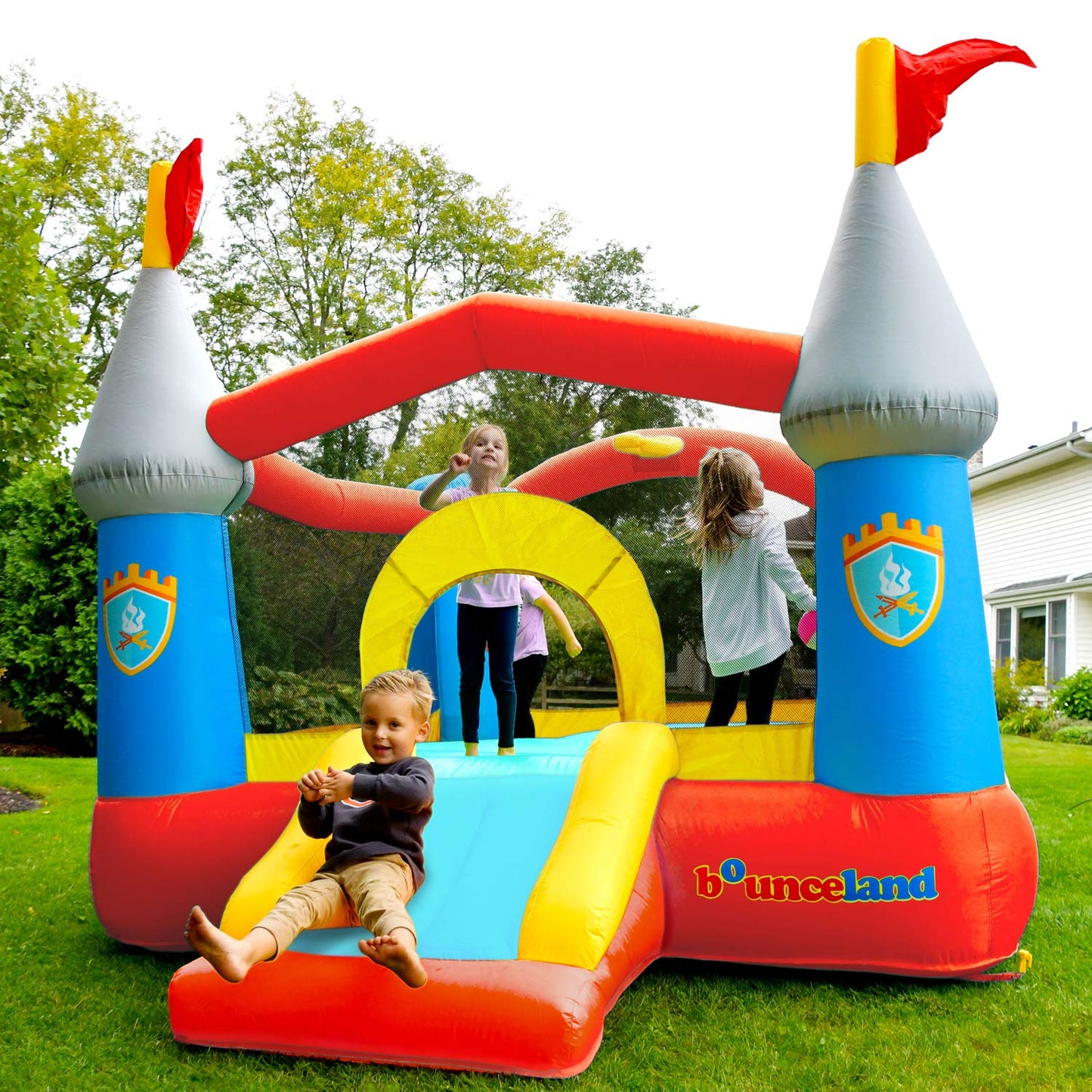 Bounceland Bounce House Castle with Basketball Hoop Inflatable Bouncer, Fun Slide, Safe Entrance Opening, UL Certified Strong Blower Included, 12 ft x