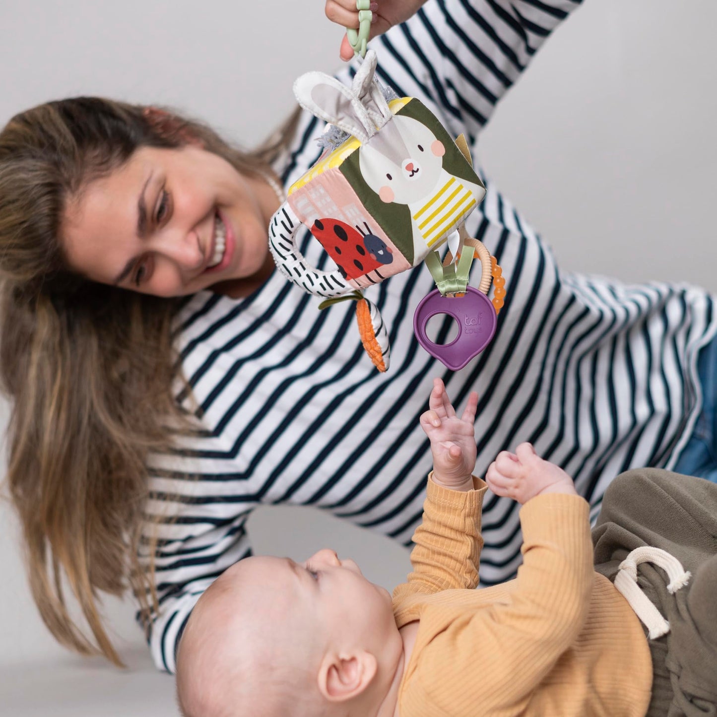 Taf Toys Activity Cube, Newborn & Baby Developmental Activity Toy. Use on Strollers, Bassinets, Crib & Car Seats. with A Mirror, Teether. Curiosity