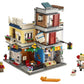 LEGO Creator 3 in 1 Townhouse Pet Shop & Café 31097 Toy Store Building Set with Bank, Town Playset with a Toy Tram, Animal Figures and Minifigures