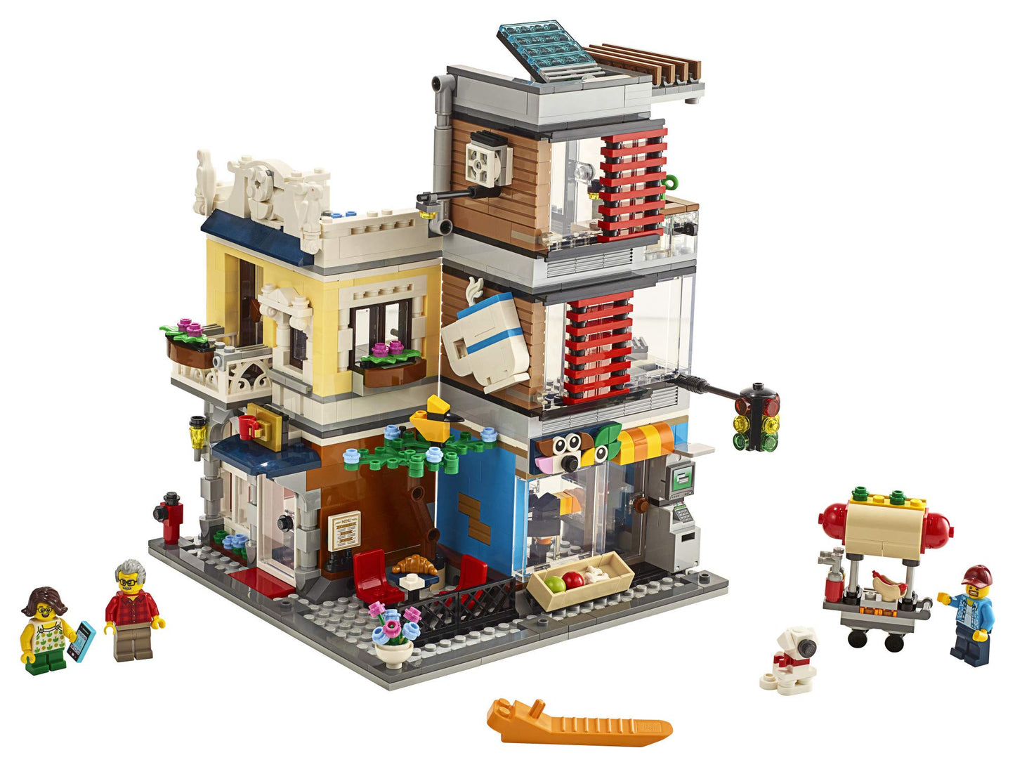 LEGO Creator 3 in 1 Townhouse Pet Shop & Café 31097 Toy Store Building Set with Bank, Town Playset with a Toy Tram, Animal Figures and Minifigures