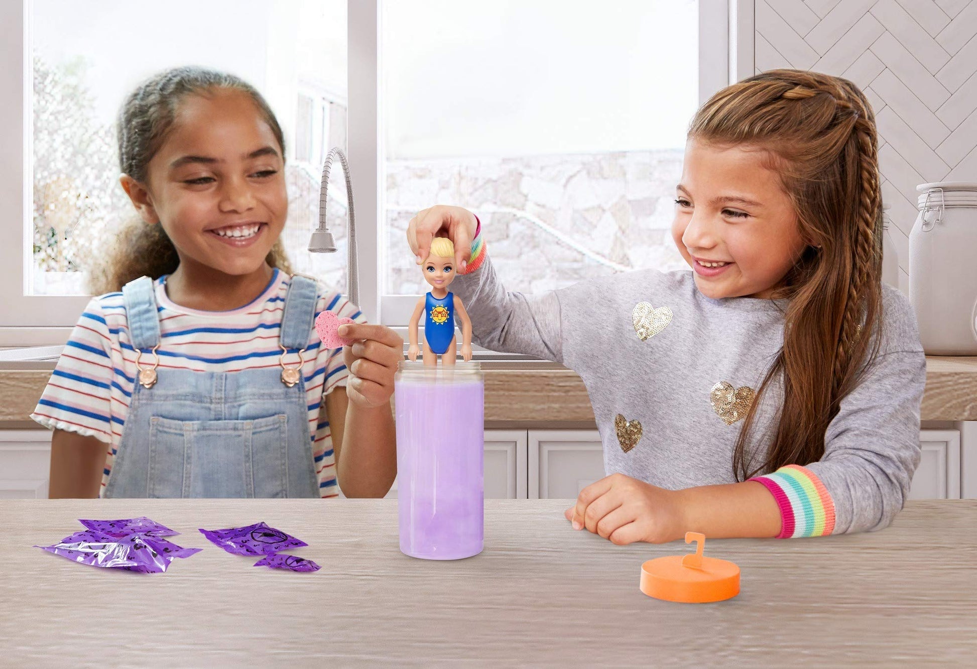 Barbie Color Reveal Chelsea Doll with 6 Surprises: Water Reveals Doll’s Look & Creates Color Change on Hair; 4 Mystery Bags Contain a Surprise