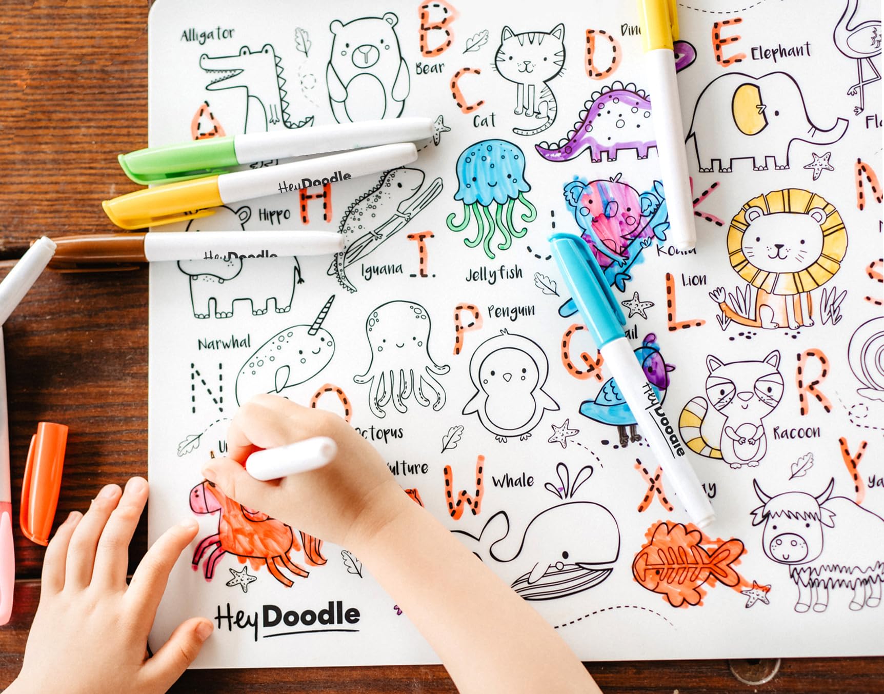 HeyDoodle Into The Wild Classic Doodle Mat - Reusable Silicone Alphabet Coloring Mat for Toddlers and Kids - Educational Animal Activity Pad with 9