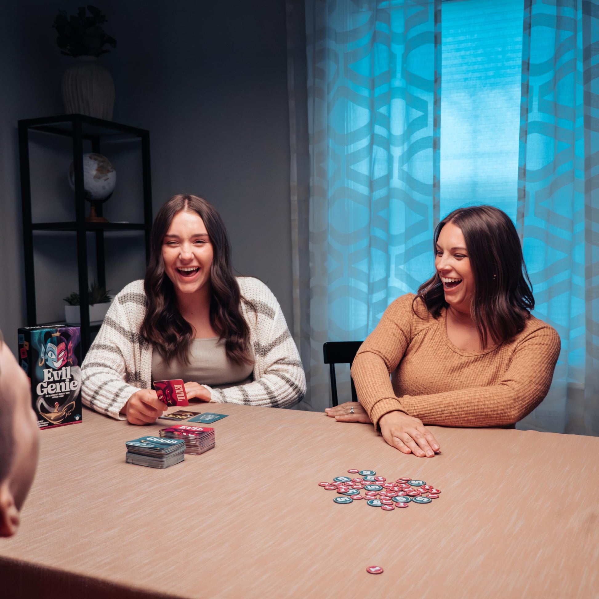 Evil Genie, Party Game Where Players Combine Good Cards with Evil Cards to Grant One Messed Up Wish, Then Guess If The Wish Will Be Taken to Score
