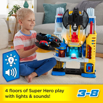 Fisher-Price Imaginext DC Super Friends, Batman Toy, Ultimate Headquarters Playset 2-Ft Tall, Lights Sounds & 10 Pieces for Kids Ages 3+ Years
