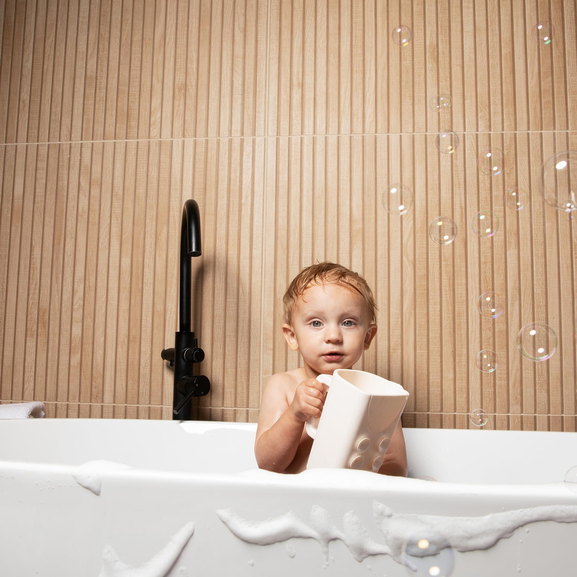 Rinzee® Baby Bath Rinse Cup with Suctions - Soft Silicone Shampoo Rinser for Kids - BPA?Free, Drains Upside Down, Sticks to Tiles. Patent Pending