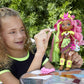 Mattel Cave Club Fernessa Doll (8-10-inch, Pink Hair) Poseable Prehistoric Fashion Doll with Dinosaur Pet and Accessories, Gift for 4 Year Olds and Up