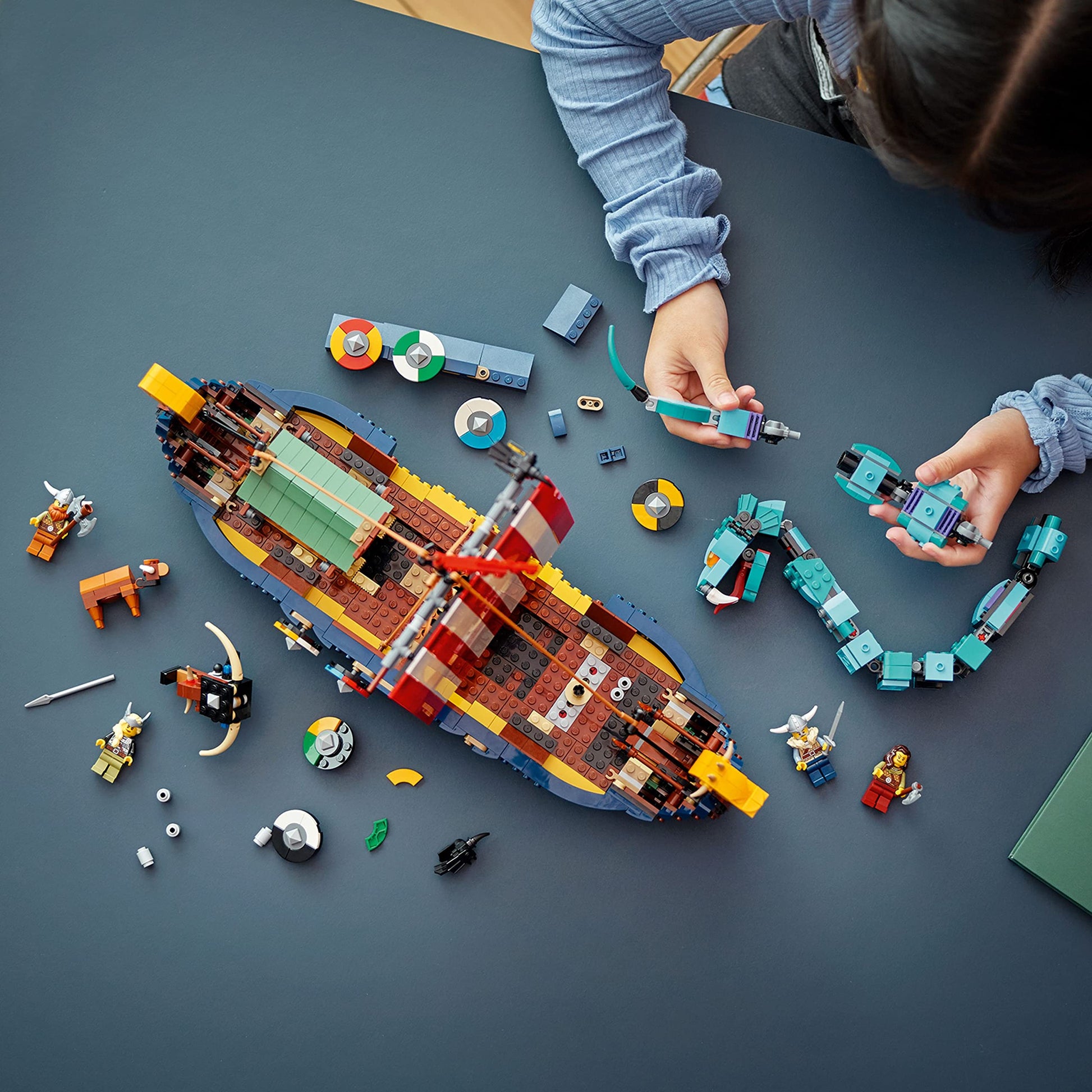 LEGO Creator 3 in 1 Viking Ship and The Midgard Serpent, Transforms from Amazing Ship to Viking House or Fenris Wolf Figure, Gifts for Kids, Boys, and