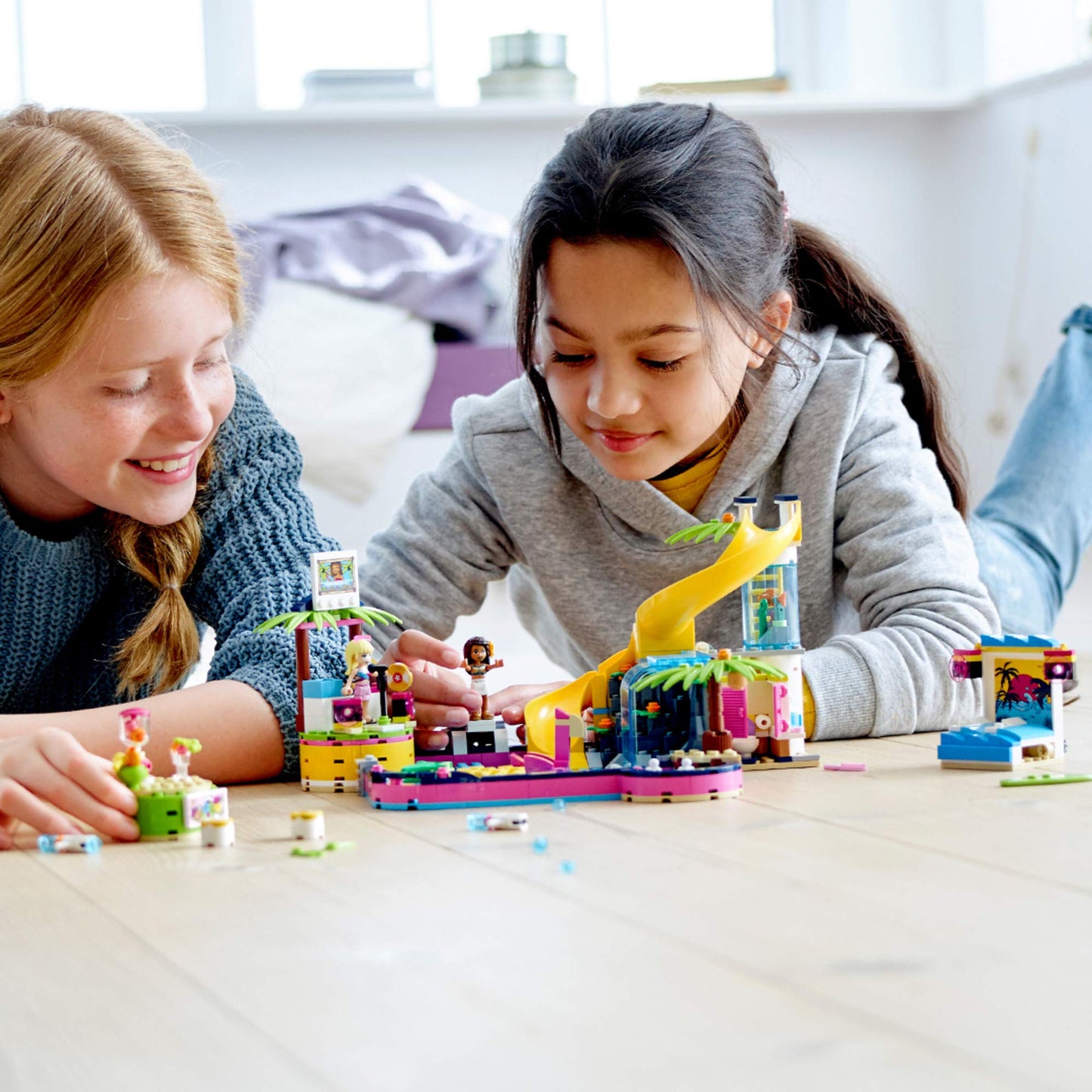 LEGO Friends Andrea's Pool Party 41374 Toy Pool Building Set with Andrea and Stephanie Mini Dolls for Pretend Play, Includes Toy Juice Bar and Wave