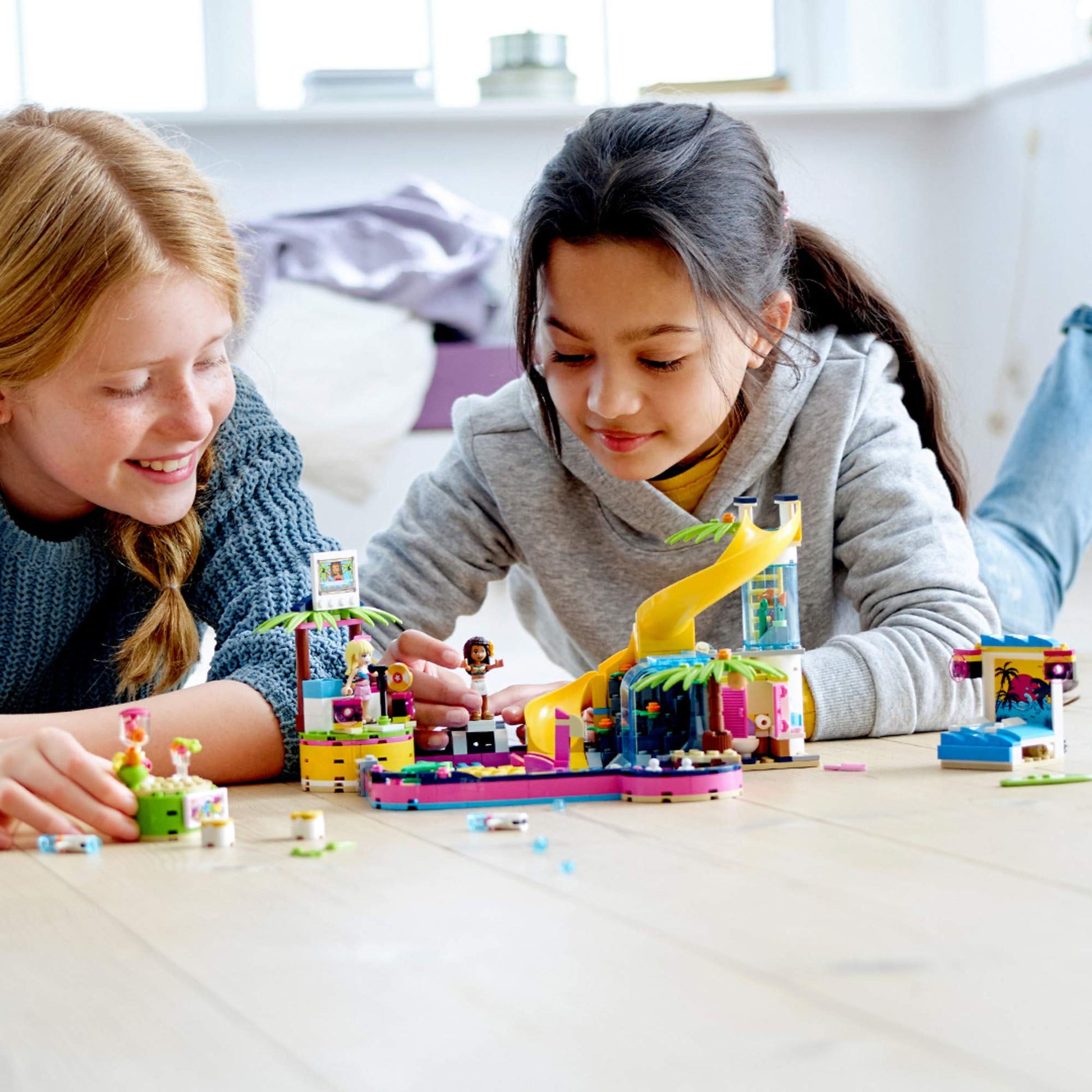 LEGO Friends Andrea's Pool Party 41374 Toy Pool Building Set with Andrea and Stephanie Mini Dolls for Pretend Play, Includes Toy Juice Bar and Wave