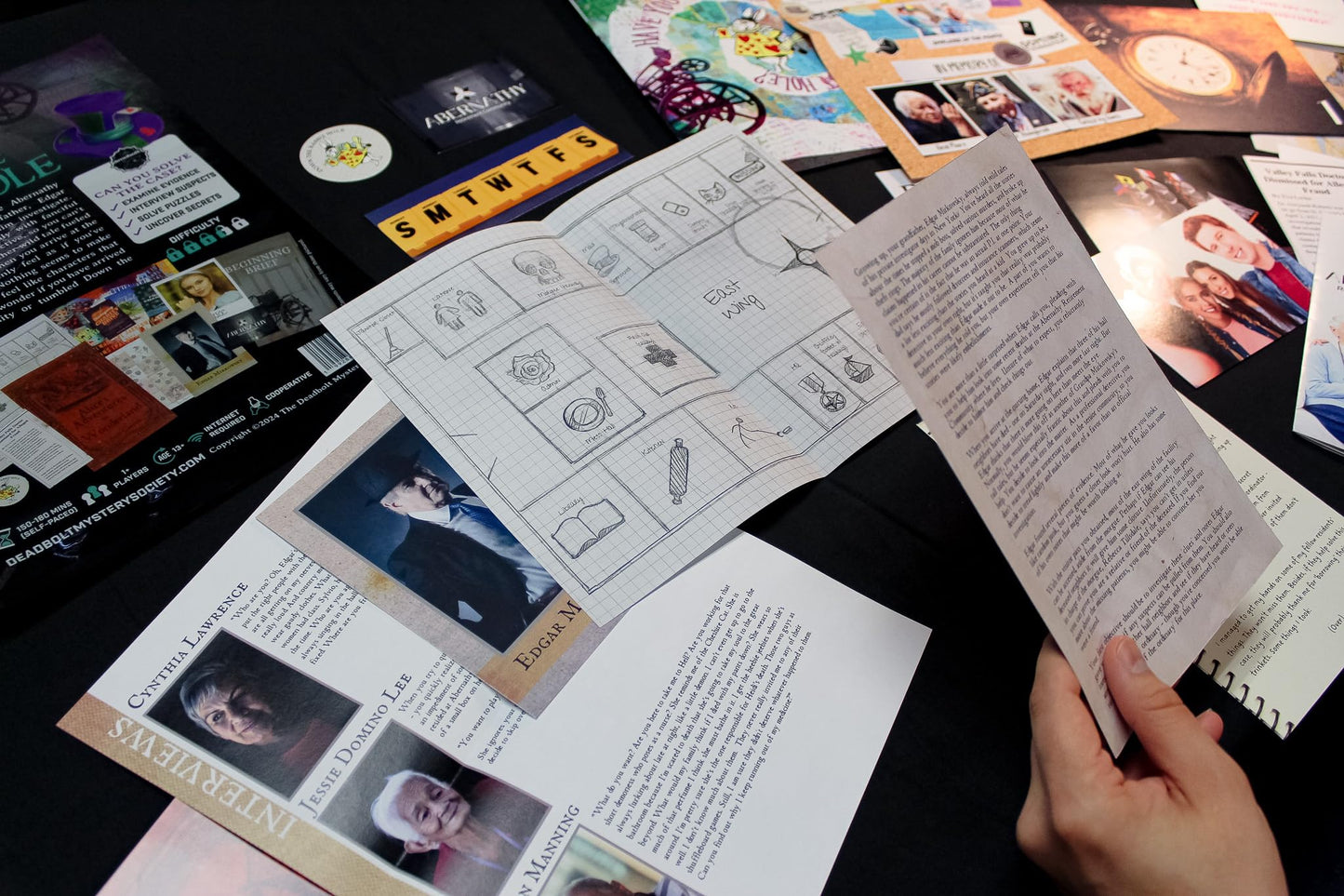 The Deadbolt Mystery Society - Down The Rabbit Hole: Murder Mystery Game - Search for Clues, Solve Puzzles, Eliminate Suspects, Solve Solo Or