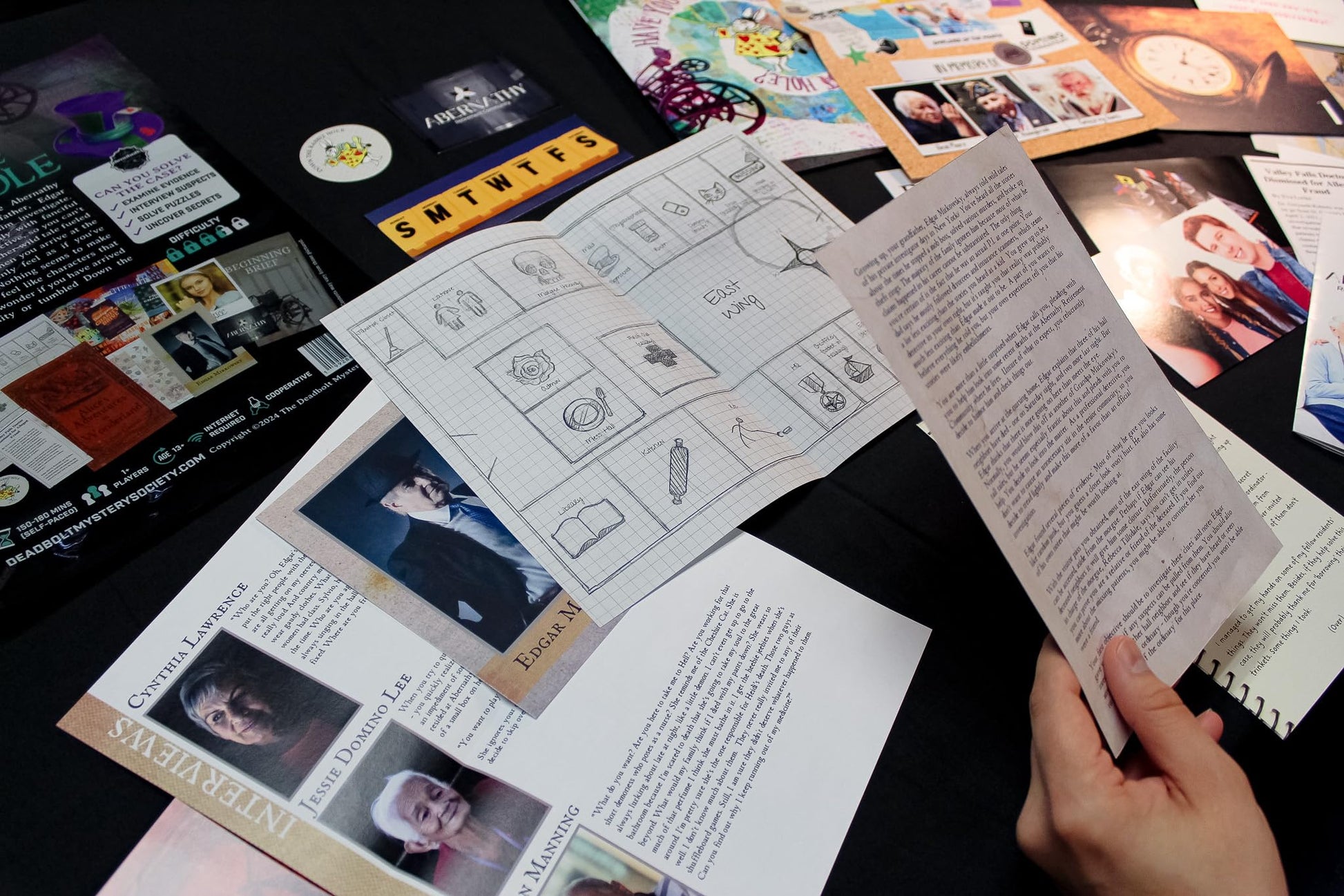 The Deadbolt Mystery Society - Down The Rabbit Hole: Murder Mystery Game - Search for Clues, Solve Puzzles, Eliminate Suspects, Solve Solo Or