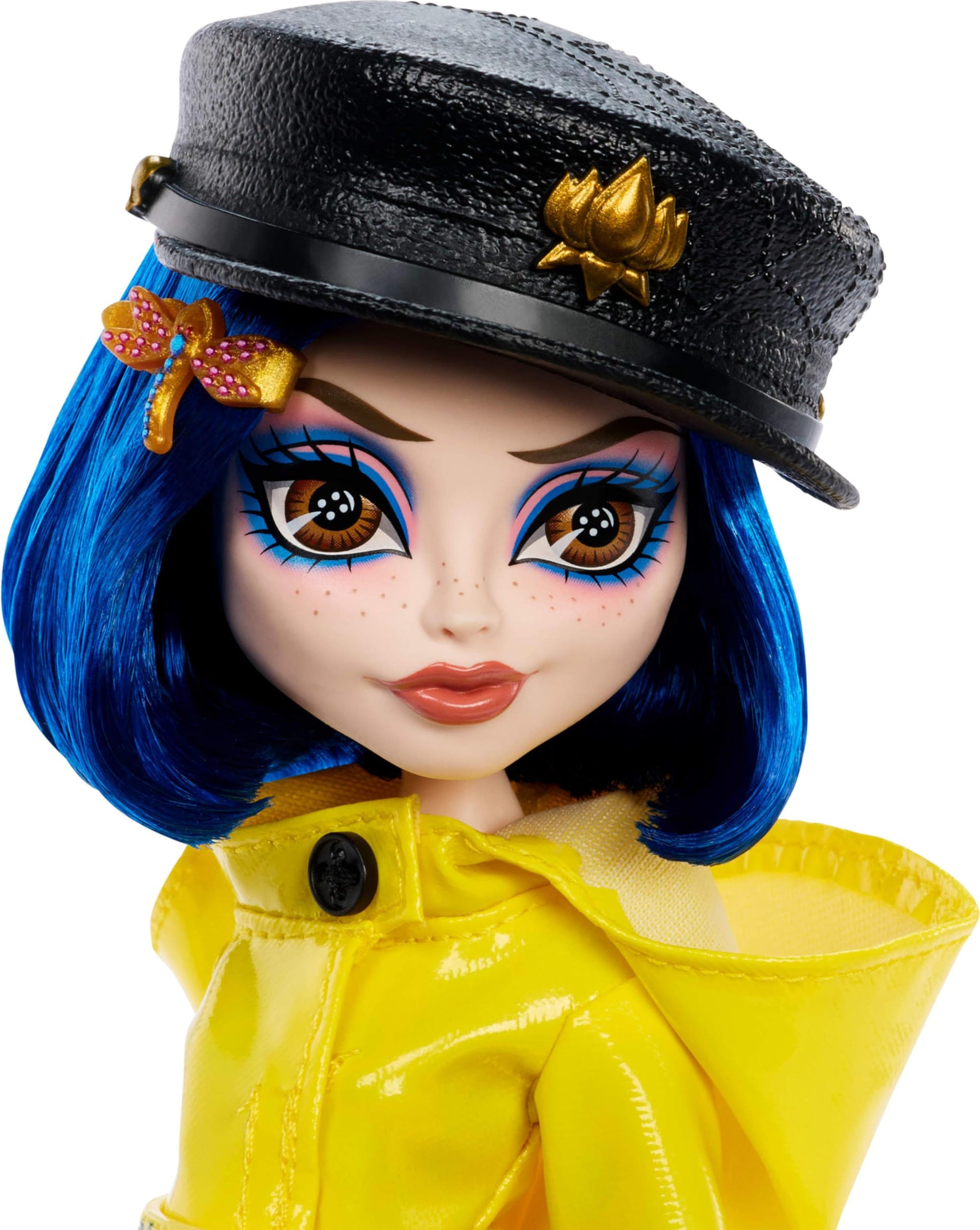 Monster High Skullector Doll, Coraline Collectible in Yellow Raincoat with Dress and Accessories Like Rag Doll, Cat Figure, and Doll Stand