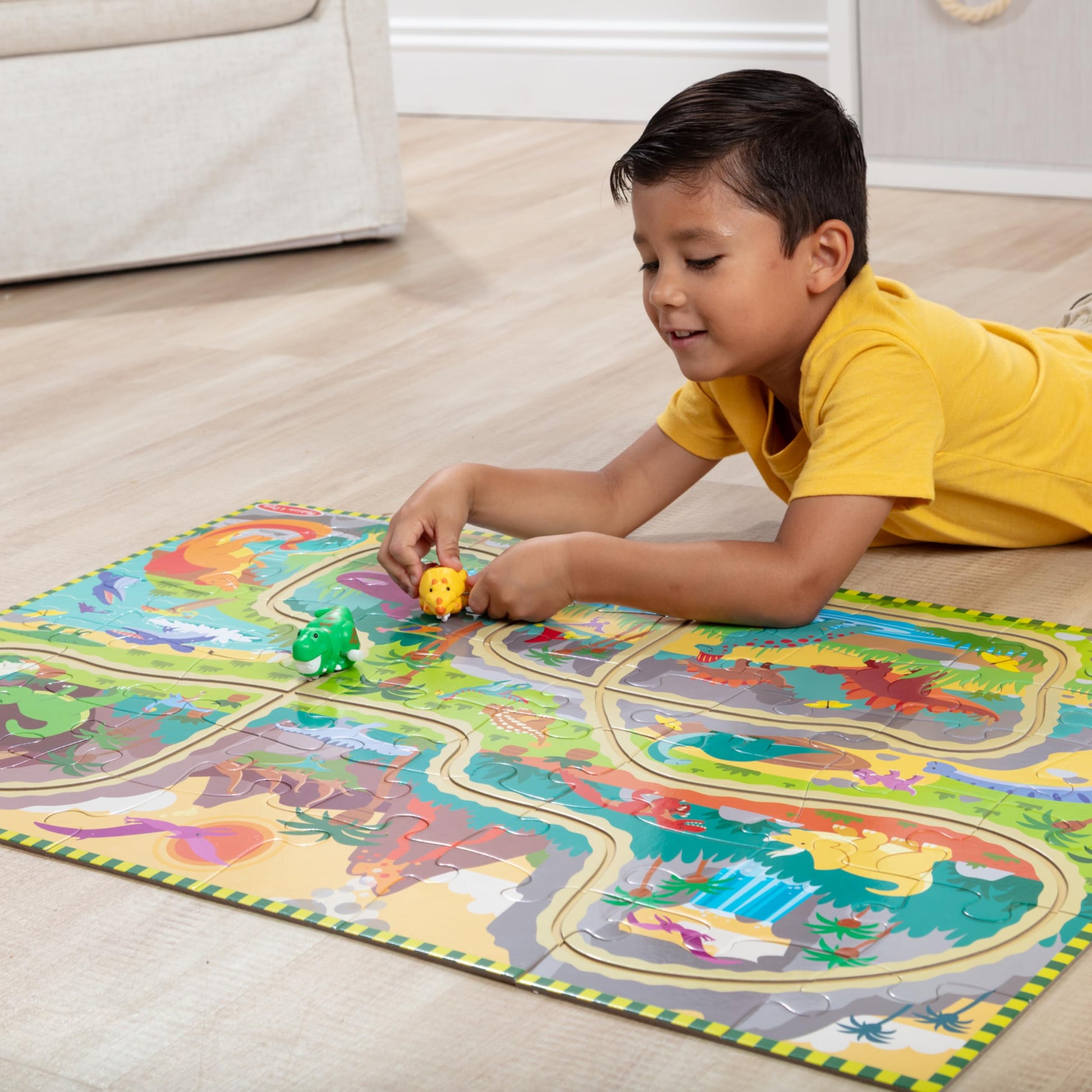 Melissa & Doug Dinosaur Adventure Tracks Cardboard Jigsaw Floor Puzzle and 2 Wind-Up Dinos - 48 Pieces, for Boys and Girls 3+