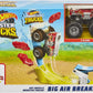 Hot Wheels Monster Trucks Big Air Breakout Play Set with 5 Alarm 1:64 Scale die-cast Metal Body Monster Truck 4 Plastic Crushed Cars 1 Slam Launcher