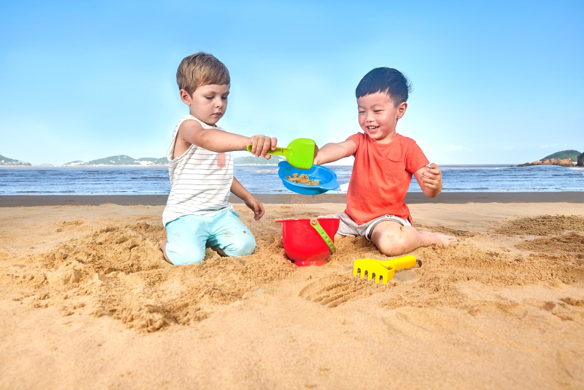 Hape Beach Basics Sand Toy Set Including Bucket Sifter, Rake, and Shovel Toys| Sand Toy Playset for Toddlers 18M+
