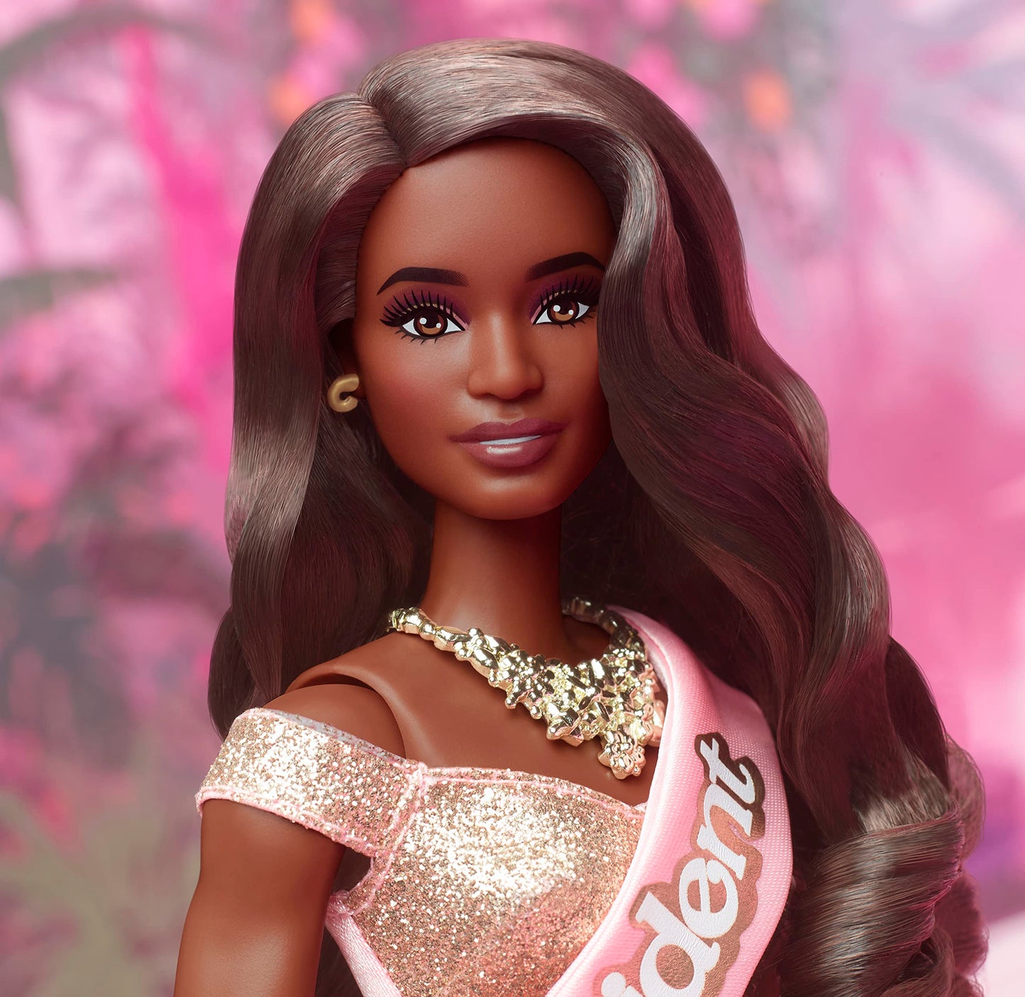 Barbie The Movie Doll, President Collectible Wearing Shimmery Pink & Gold Dress with Sash