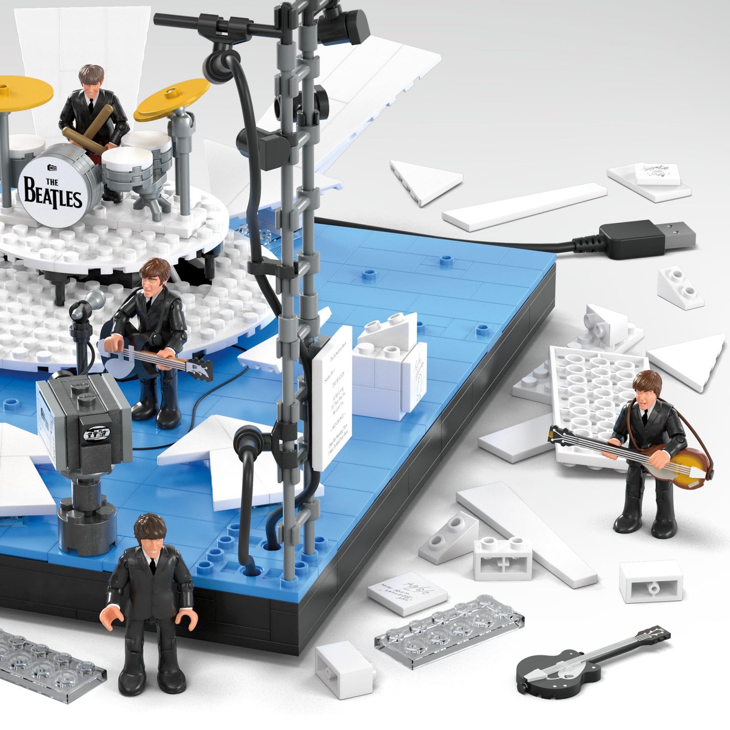 MEGA The Beatles Building Set with 681 Pieces, 4 Poseable Action Figures and Ed Sullivan Stage, with LED Lights, for Adult Collectors