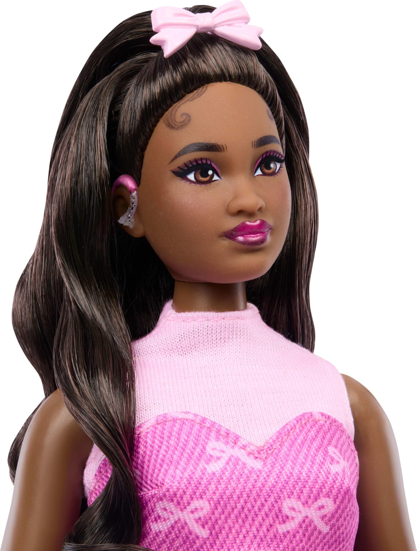 Barbie Deluxe Style Doll #10 in Pink Denim Top and Skirt Set with Bow Print, Black Hair, Behind-the-Ear Hearing Aids and Accessories Like Handbag