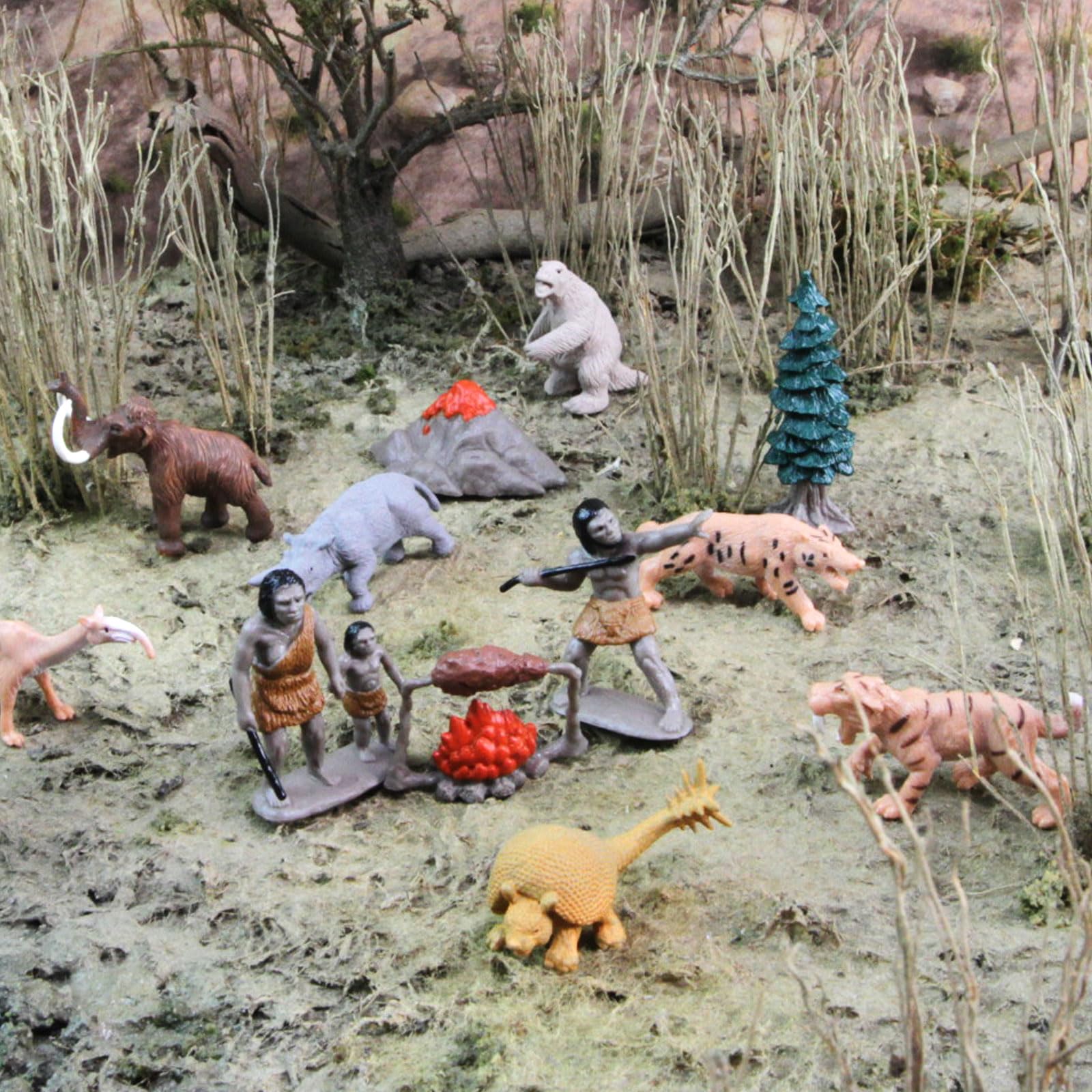 Safari Ltd. Prehistoric Life TOOB - 12 Figurines: Caveman, Cavewoman, Volcano, Mammoth, Doedicurus, Smilodon, Sloth, Dinosaurs - Educational Toy